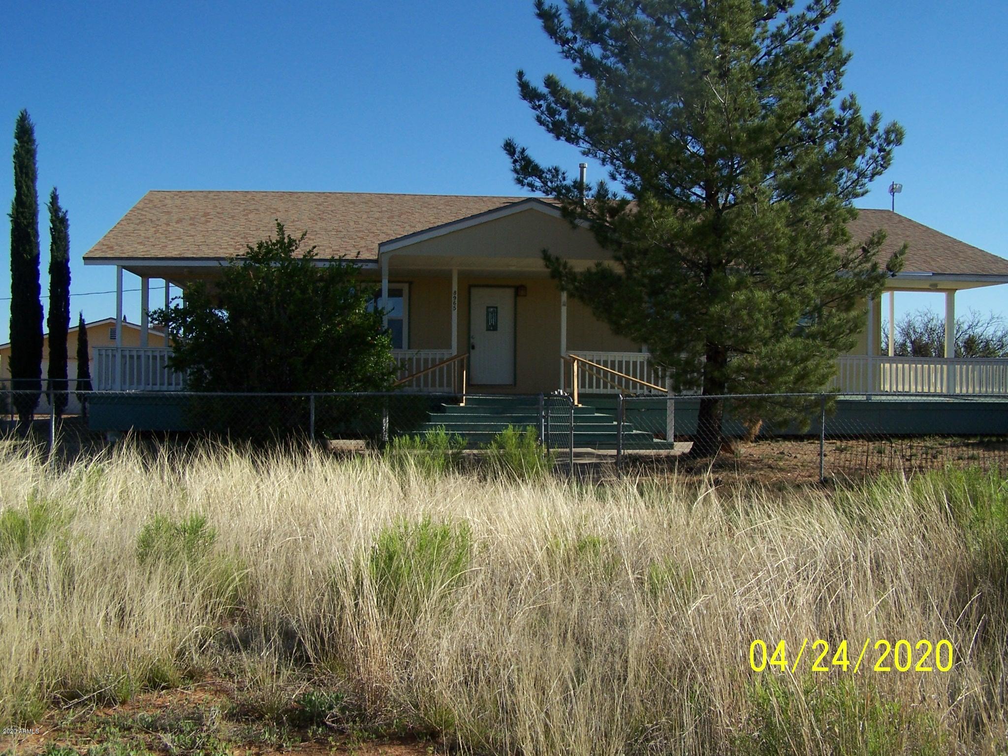 This is a really neat home and property! A rare jem that includes a full basement. There are 3 bedrooms and 2 baths on the main level. In the basement there is a big room, plus a wet bar area, office and huge pantry. Outside there is a wrap around porch to watch the sunrises and sunsets as well as a very oversized 2 car gaage. There is a large concrete pad next to the garage to park or maybe a play area. Seller financing MAY be available on this property. Please contact the listing agent to get further details.