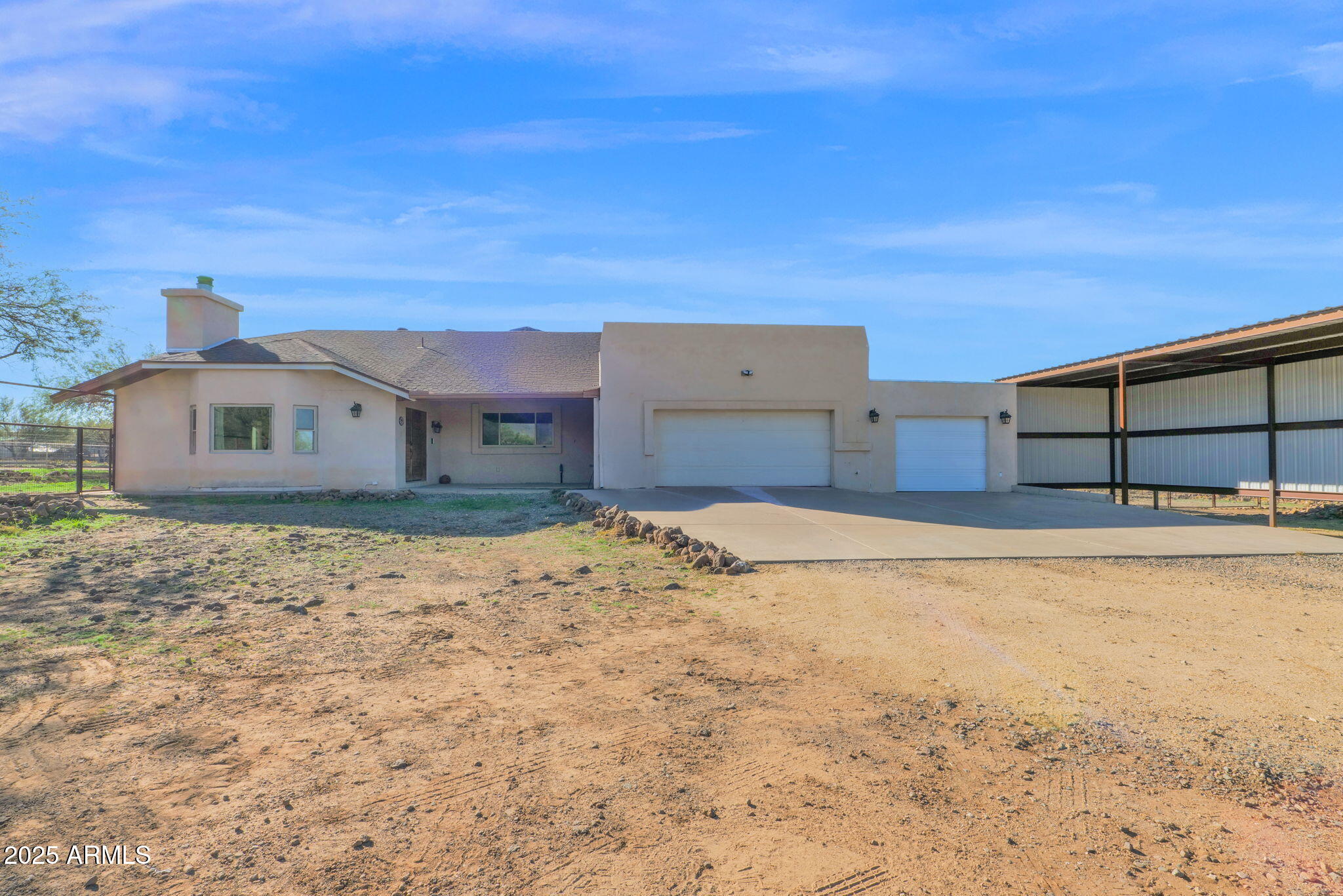 PRIME LAND OPPORTUNITY 2.3 ACRES IN DESIRABLE CIRCLE MTN. SELLER IS MOTIVATED- 2893 Sq ft-Tile Throughout!  Fenced w no climb.  Close to TONTO Kitchen features hard to find Double oven, plus a built in Microwave! Large Island Formal dining/family room option w Sliding doors to Covered patio.  Wet Bar,  also has room for Dining. Primary Bedroom has sliders with views exiting to Patio.  2 closets Large walk-in.  Retablo Vanitys in updated bathrooms along w marble surrounds shower and tub. 2 gates to access Fenced property. Bonus Room in Garage that has a 1/2 bath to use as a Office/workshop area/Guests! Covered Pens 40x40/Large Fenced turn out.  ROOM TO BUILD ADDTIONAL WORKSHOP!  RV PARKING- COVERED CARPORT 4CGARAGE PANEL UPGRADED TO 50 AMP!