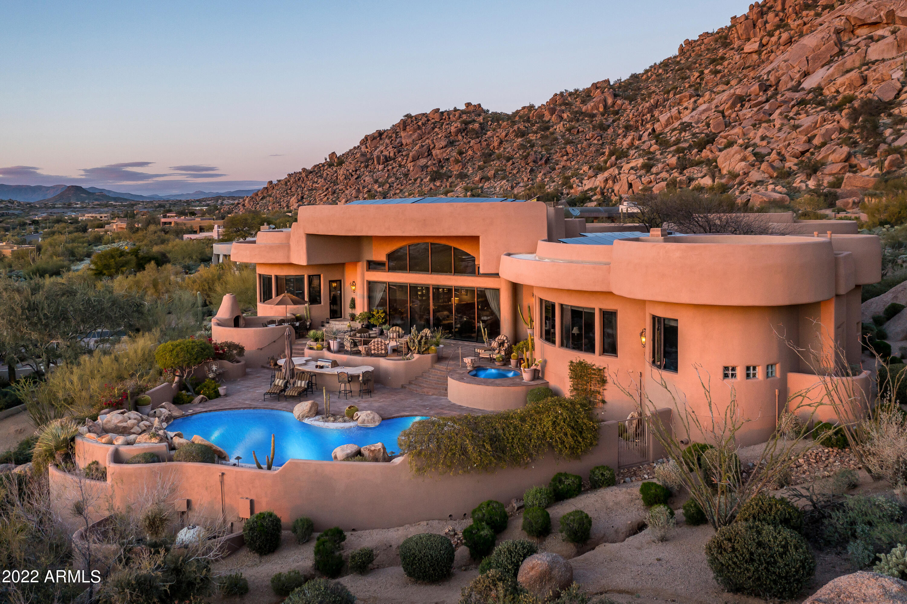 Significant Price Reduction. This UNIQUE ONE OF A KIND custom home with million dollar views
and superior craftsmanship boasts attention to detail from it's grand
chandeliered entryway to its dazzling resort-style backyard. An
architecturally stunning and elegantly appointed home with
breathtaking unobstructed mountain & city light views invite a feeling
of tranquility & privacy. Floor to ceiling views from the Great Room
sliding doors beg you to stop and gaze at the beautiful Arizona sunsets.
This beautiful home on an elevated premium 1.9 acre lot is a showcase
of unmatched luxury living for those who demand the best in quality &
unsurpassed classic beauty. See document for numerous details
pertaining to this remarkable home.