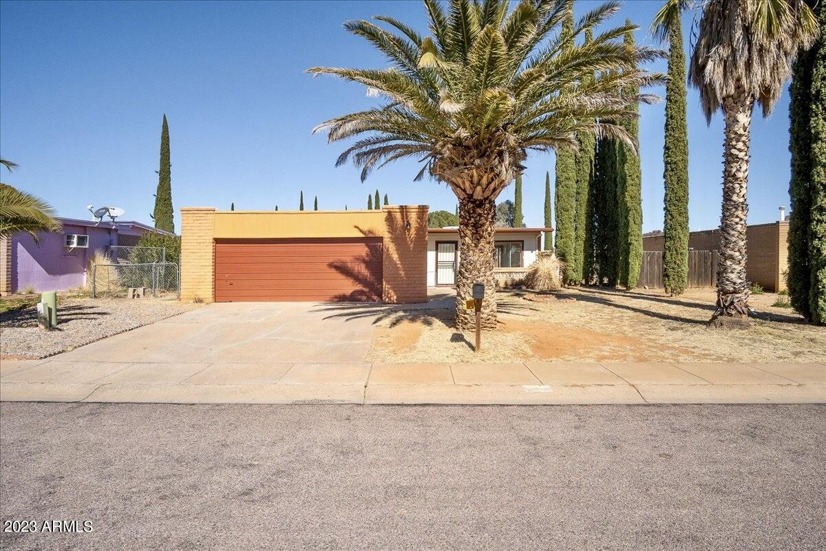 This is it, ready to move in NOW- 3 bdr 2 bath home. Fresh paint helps to show off this bright home. Full 2 car garage. Large front window washes the living room in light. Nicely maintained yard front & back/covered patio with minimal maintenance required, space to make it your own! Well established neighborhood very close to Ft Huachuca.