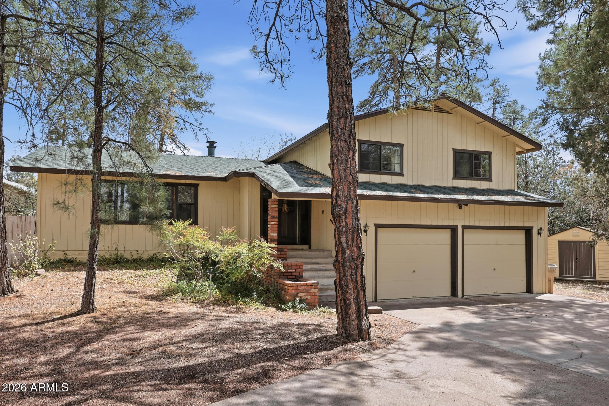 Tucked away on a quiet cul-de-sac, this rare find boasts a spacious layout featuring upstairs  primary suite and two  bedrooms. Main floor has Living room with a wood burning fireplace, kitchen and dining. Down the stairs is lower-level guests, teens, or in-laws suite with bathroom. Every bedroom is generously sized. This is a 3 level home with stairs for separation and privacy. No bedrooms on same level as kitchen and living room.  All major appliances included. Large laundry room with sink and storage.   The magic continues outside with an expansive backyard with huge potential and space to be your private oasis.  Backyard features a greenhouse, chicken coop, two water capture tanks, and a large shed. BBQ smoker conveys &  roof was replaced in 2023 -roof warranty transferrable.