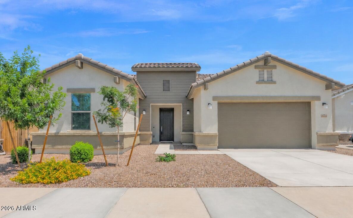 Location! Location! Move-In Ready New Construction Home. Situated on a desirable cul-de-sac homesite backing to open space with no homes behind and just steps from the 10-mile walking and biking path. Nestled in the sought-after Hastings Farms subdivision, close to Queen Creek Marketplace shopping, dining, entertainment, and A+ rated schools. This beautiful home offers the perfect blend of comfort, style, and modern amenities, featuring a stainless gas cooktop, double wall ovens, maple shaker cabinetry, quartz kitchen and island countertops, plank tile flooring, and more. Refrigerator, washer, dryer, window blinds, and backyard landscaping are also included! Community amenities include parks with grills and ramadas, a soccer field, and basketball courts. Don't wait--come see this home!