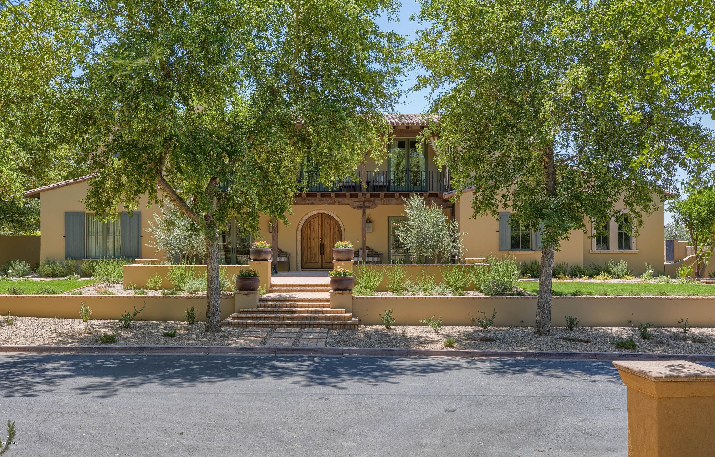 Serene & Sophisticated, this Spanish Colonial Revival in Silverleaf Arcadia exudes perfection. Featured on the cover of Phoenix Home & Garden Magazine, this home wraps you in warm, neutral colors & exquisite natural finishes.  It’s architecture includes: 24’ Ceilings, French Oak Floors, Custom Chandeliers, Indoor/Outdoor Wooden beams, Cantera window sills & door surrounds, natural light, large upstairs bonus room w/ balconies to view mountain & city lights, large bdrms w/ ensuite baths, Custom Built-Ins in Study & Bdrms & Huge Accordion Doors.  Retreat in the large private pool, spa, Huge Ramada, & large backyard.  The spacious kitchen features, Large Carrera Countertop & Backsplashes, WOLF, Sub-Zero & Asko appliances. SmartHome Automation controls lighting, HVAC, Security, TV’s, & Music. FLOOR PLAN
5 Bed + Den + Office / 6 Bath / 6,535 SF  / 4-Car
Ample room for visiting friends and large gatherings
All large guest bedrooms w/ ensuite baths
Large upstairs bonus room with view balconies to mountain & city light views
Copious Natural Light
All McDowell mountain peaks can be seen


FINISHES
New Tongue and Groove Ceilings in Kitchen and Office
New custom built-in cabinets in study & bedrooms
New Chandeliers and light fixtures
Hi-End water fixtures throughout
Lime-Washed French Oak Floors 
Carrera Marble Countertop & Backsplashes 
Limestone counter tops in laundry room
Dark wooden beams
Neutral, warm colors
Metal, Glass and Mirror accent the neutral surroundings
Ornate Crystal Chandeliers
Antiqued nickel hardware and candelabras
All wood casing windows inside with metal clad outside for weather protection
All drawers are self close
All Toto toilets
House sealed

FRONT YARD & ENTRY
Completely new Landscape and Hardscape in front and back
Mature Landscaping
2 New olive trees
New Herringbone pattern bricks 
New curtains
Brick caps on pony walls 
Cantera Stone Window Sills
Cantera Stone Door Surrounds
Outdoor Balcony

BACKYARD
Completely new Landscape and Hardscape
Japanese Holly
New Herringbone pattern travertine pool deck and,
New Water feature back splash tile featuring new planted sconces 
Mature Landscaping

BACK PATIO
New TV
Mediterranean string lights
Tiki light torches
Terraced the patio to pool landscaping
New 4x4 pattern tile travertine
New Herringbone pattern travertine 

RAMADA
New TV
Mediterranean string lights
Restoration hardware carpet
New 36x38 inch Delta Heat grill w/ Side gas burner

MASTER BEDROOM SUITE
New Artwork & Mirror
Ornate Crystal Chandeliers
Storage door under stairs
Work-out room
Custom built-in cabinets
Custom closets

MASTER BATHROOM
Carrera Marble Floor
Carrera Marble Lower Back Wall
Ornate Crystal Chandelier
Carrera Marble Walk-thru shower
Separate His and Her Water closets

KITCHEN
Open & Spacious
Tongue & Groove ceilings
Large Carrera Marble Countertop  
Silver Banded Glass Pendant Lights hung from thick rope
Carrera Marble Subway Backsplash
Glazed cabinets with English dovetail construction and antiqued nickel hardware
WOLF, Sub-Zero and Asko appliances

GREAT ROOM
Soaring 24' Vaulted Ceilings
Lime-Washed French Oak Floors
Custom Designed Cabinets flanking the Fireplace to fit niches
New Custom Chandelier
New TV
Crestron SmartHome Automation for lighting, weather forecast temperatures, HVAC, Security, TV's, & Music.  Remotely controllable via phone app.
LED lights throughout (low electric bill)

POWDER ROOM
Tumbled Quartzsite Tile Flooring
Wood Vanity w/ Limestone countertops
New mirror
Hi-End water fixture
All Toto toilets

BREAKFAST AREA
Atrium Style
Roman Shades

ALL NEW TV's
Master
Great Room
Bonus Room
Back Patio
Ramada

STUDY/OFFICE
New custom built-in cabinets and shelving 
New matching desk
New Chandelier
New Tongue and Groove Ceiling
Lime-Washed French Oak Floors
Storage closet

POOL BATH 
Marble countertop
Wayne's coating w/ subway tile

DINING ROOM
2 New Sconces
New Mirror

BUTLERS PANTRY
Wine fridge
Limestone
Sink
Pantry

4 CAR GARAGE
Epoxy Flooring
New Water Heaters
All new garage door springs and openers

LOFT
New Cabinets and Entertainment Center
New TV
New Home Automation
New Ceiling Fan
New shelf w/ fridge

UPSTAIRS LAUNDRY
Washer and Dryer

BEDROOM 2
Natural Stone Bath Finishes
Camelback Mountain views
All walk in closets
All Toto toilets

BEDROOM 3
New built-in Cabinets with Crown Molding 
Natural Stone Bath Finishes
Big Square Tile
All walk in closets
All Toto toilets

BEDROOM 4
Natural Stone Bath Finishes
Cobblestone Brick Marble Bath Flooring
Iridescent Shower tile
McDowell Mountain views
All walk in closets
All Toto toilets


GUEST HOUSE
Large Closet
Modern tile
Limestone countertops
All Toto toilets

FURNITURE & TV'S AVAILABLE ON SEPARATE BILL OF SALE