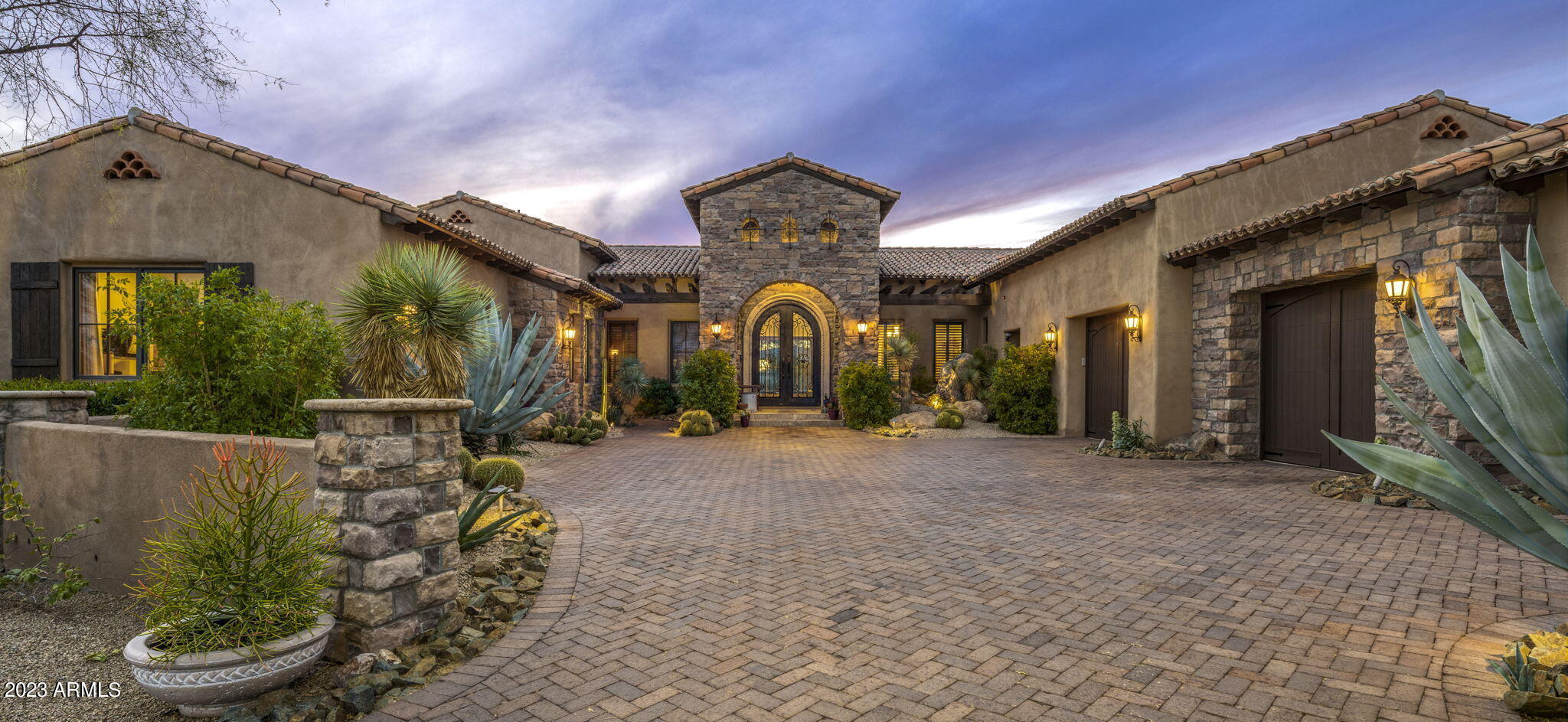 MIRABEL CLUB GOLF MEMBERSHIP AVAILABLE PER THE CLUB BYLAWS. Enjoy the stunning Arizona sunsets from this Santa Barbara-style home located on double lot on a quiet cul-de-sac in the prestigious Mirabel Club community. Home features an open light & bright great room floor plan that wraps around a sparkling pool and cozy covered outdoor living spaces, with additional recently added covered bar space. The home offers 3 bedrooms, a large home office/flex space, and 4 & 1/2 baths including a separate pool bath with an additional shower. The chef's kitchen is well equipped with a professional stainless steel range & cook top with 2 ovens & Sub Zero refrigerator. Homeowner purchased adjacent lot & combined them, making this parcel almost 2 acres.