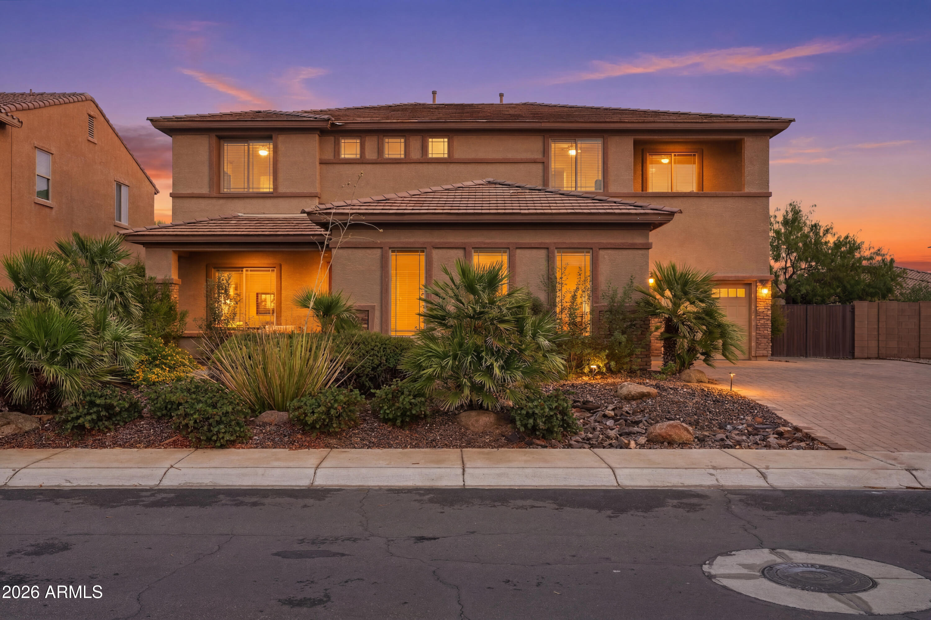 WELCOME HOME to this STUNNING, bright and open concept floor plan in the East Valley's coveted Bridges community! This GRAND, 5 bedroom/3.5 bath model like home spares no missed detail including an OUTDOOR oasis! Thoughtful upgrades give this home so much charm!l Large entertainer's modern chef kitchen boasts extra cabinets, granite countertops, walk in pantry and large oversized island.Private backyard is perfect with view fencing and single level homes behind. 3 pane slider leads to the Massive pool with waterslide. Built in BBQ , shed and RV Gate! 3 car garage. Parks, fishing lake, walking paths and the pride of  living in one  of the valley's hottest zip codes  with growth and opportunity galore. Close to freeways, dining, shopping and great school choices. This home is a MUST SEE!