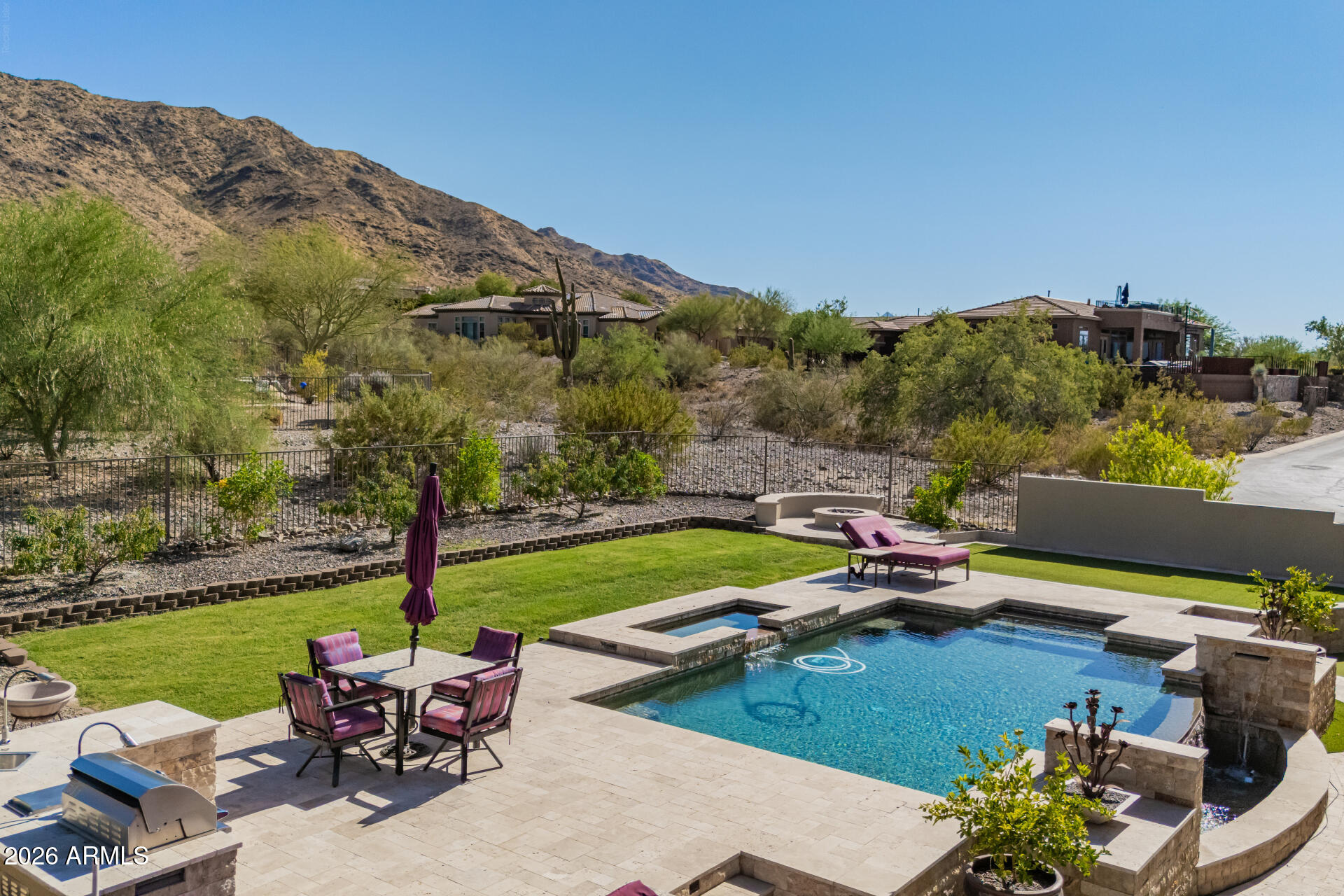 Welcome to your private resort-style oasis in the exclusive gated community of Talasera! This beautifully upgraded home is designed for both relaxation and entertaining, featuring a heated pool and spa, a dedicated outdoor BBQ area, misting system, and a brand-new awning-perfect for enjoying Arizona living year-round. The home also includes newly owned solar for energy efficiency and long-term savings. Inside, you'll find soaring ceilings and an open, inviting layout. The spacious kitchen is an entertainer's dream, complete with double ovens, granite countertops, and plenty of room to gather. Fresh interior paint and high-end new fixtures throughout add a modern, refined touch.
This exceptional home blends comfort, style, and functionality--stay tuned for professional photos coming soon!