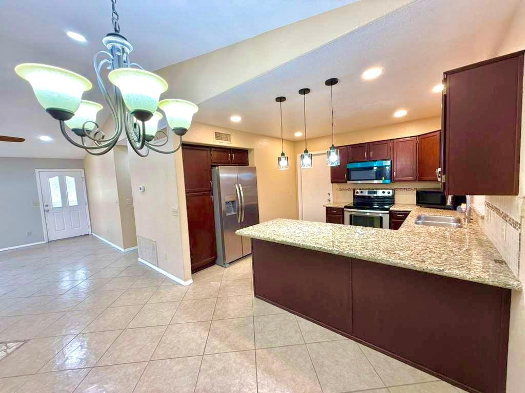Beautiful 3-bedroom, 2-bath home located in the desirable Arrowhead Ranch community! This move-in ready home offers a bright and open floor plan with plenty of natural light, a spacious kitchen with ample cabinet space and breakfast bar,  Enjoy the easy-care turf backyard, perfect for relaxing or entertaining guests. Conveniently close to shopping, dining, golf courses, parks, and top-rated schools. A wonderful place to call home!
