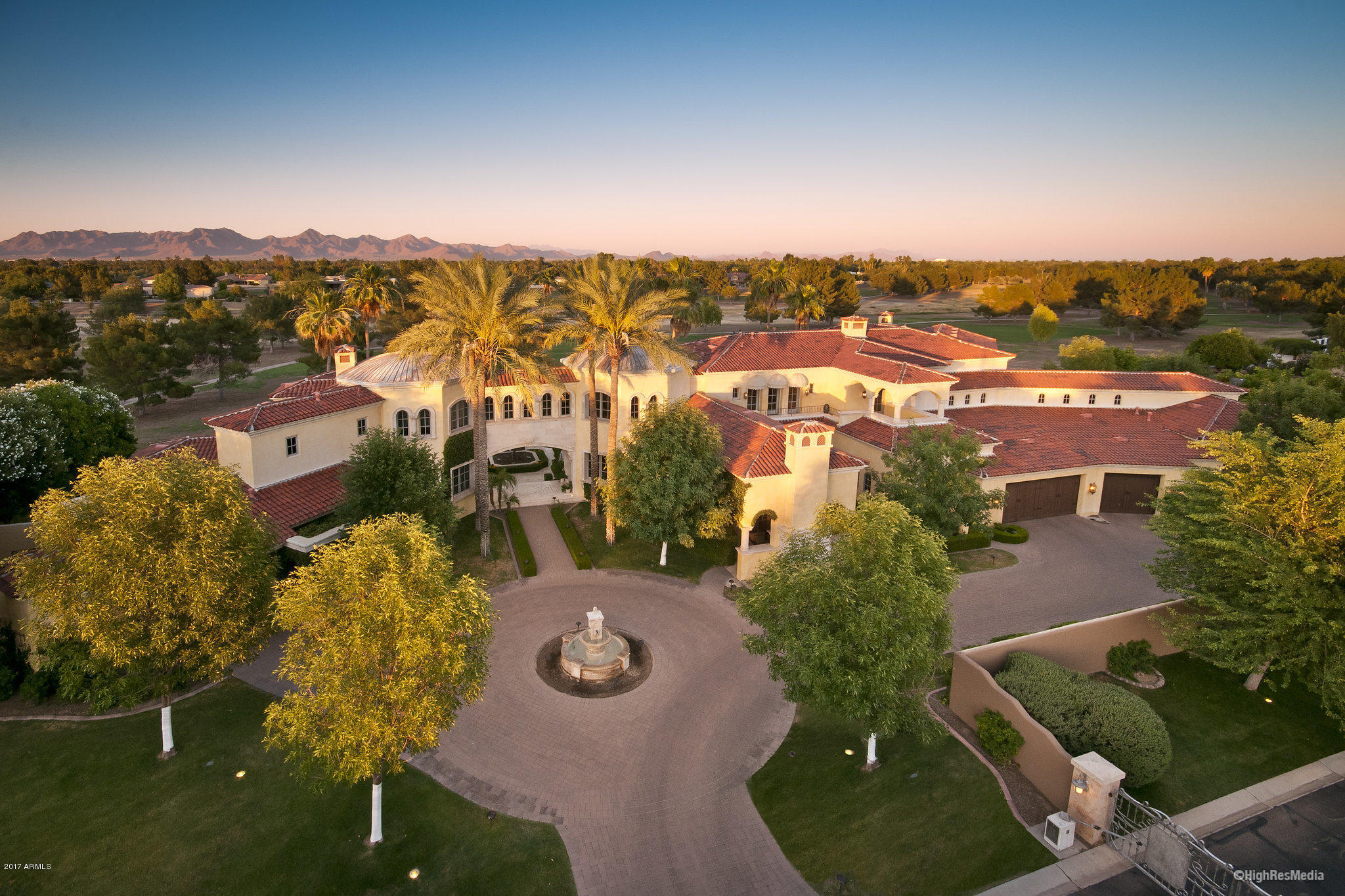US Bankruptcy Court Directed Auction - To be sold at subject to a minimum bid of $3.7 million on December 5th.  Contact agent for details. The grand scale of this elegant yet comfortable 12,200 sq. ft. villa is sure to impress.  Located in Hidden Paradise, a gated community and backing to Camelback Golf Course this property home boasts an incredible floorplan with great traffic flow and is equally impressive as it is versatile.  A mix of voluminous and intimate, formal and informal living spaces throughout lend themselves perfectly to relaxing, entertaining or recreation and include four bedrooms and a two-bedroom casita.