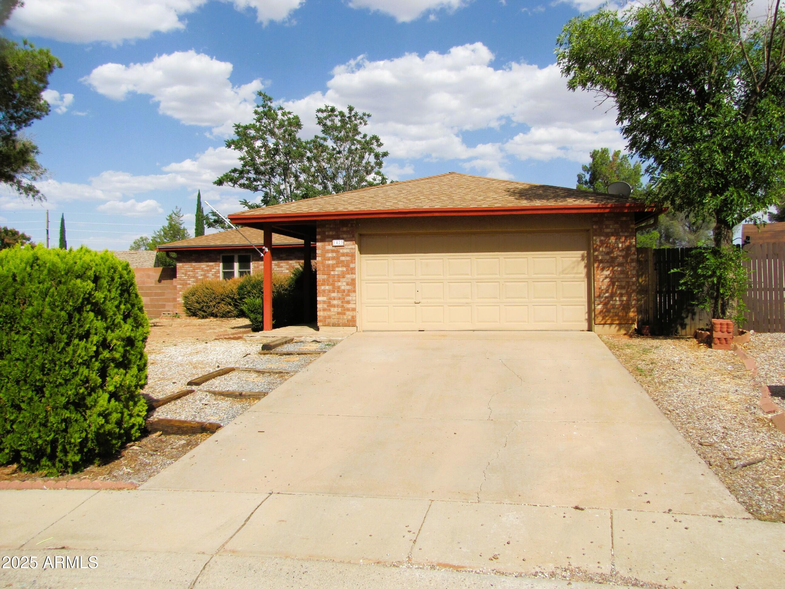 This 3BR/2BA./2CG, 1480 sq.ft. rental in Sierra Vista, AZ is minutes from Ft.Huachuca, shopping PDS Elementary School and Canyon Vista Medical Center. The spacious floor plan includes a wood-burning fireplace and central A/C.  The bathrooms have been remodeled. All newer floors throughout this great house, no carpet whatsoever. Big beautiful backyard with a covered porch.