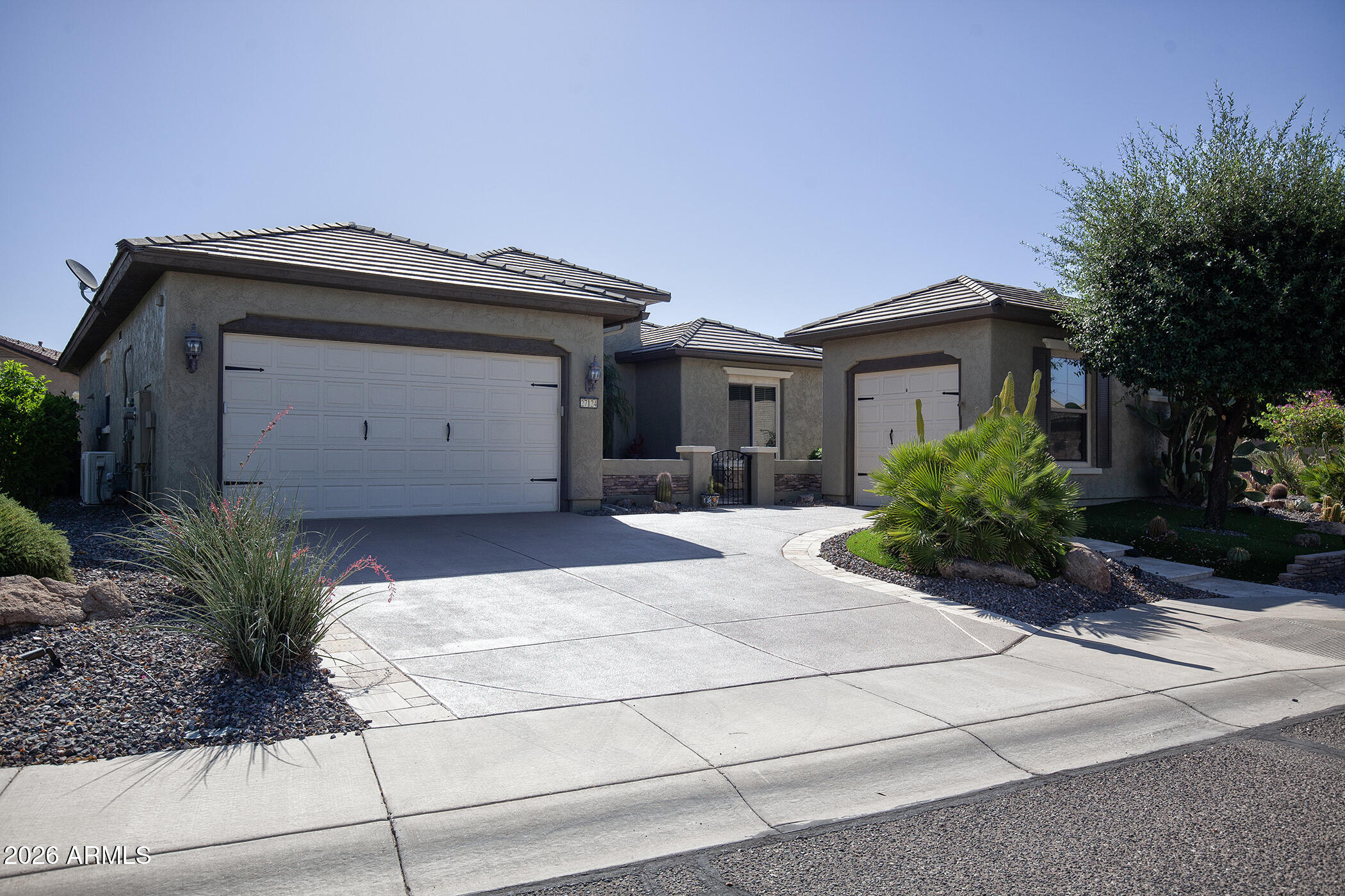 Welcome to an UPGRADED Jubilee model with a PRIVATE BACKYARD OASIS and distinctive, one-of-a-kind features. Situated on an 11,008 sq ft lot, this home HAS EVERYTHING you are looking for: 3- car Garage w/Mini-Split & Insulation in main attached garage, Newer HVAC, New Hot Water Heater, New Flooring, Custom Bar Area, Upgraded Bathroom, unique ''Mission Door'' Designed Wall, Front Courtyard & Large Side Travertine Patio , New Irrigation System, Extended Travertine Back Patio, Pergola,  Built-in BBQ w/Island, Fire Pit w/Pony Wall, Misting System, Heater, Fountain, Turf, Private Fenced Yard, Solar & SO MUCH MORE. The kitchen highlights Granite Countertops, Tiled Backsplash, Upgraded Cabinets, Slide-out Shelves, St/St Appliances, Island & Sunny Breakfast Nook. Owner's en suite has Tiled Walk-in Shower Dual Sink, Custom Cabinetry & Walk-in Closet. Large Laundry Room w/Utility Sink provides extra storage. Guests will be impressed with their quarters offering a large closet and adjacent Full Bath. This home is an Entertainer's Delight! It is the Perfect Time to Start Building Lasting Memories in your new DREAM HOME. You are going to love the ACTIVE LIFESTYLE Sun City Festival offers with World-Class Amenities.