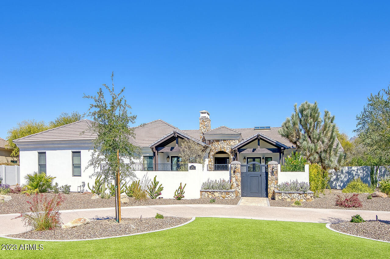 You do not want to miss this beautiful home with a large guest house, parklike backyard, sparkling pool and sport court. Enter through the private courtyard, to the stunning entrance. The home features marble countertops, Thermador appliances and a large island with banquette seating in the kitchen. Built-in cabinetry throughout, steam shower and jetted tub in master bath. All 5 bedrooms in main home are en-suite plus an office. The guest house has 2 bedrooms, a large living area, a basements and 2 car garage. Enjoy the beautiful mountain views, entertaining by the fire and watch your favorite movie on the large outdoor patio. Total of 5 car-plus garage(s) with storage. Close to the 101, shopping, walking/bike paths. NO HOA! This home has it all