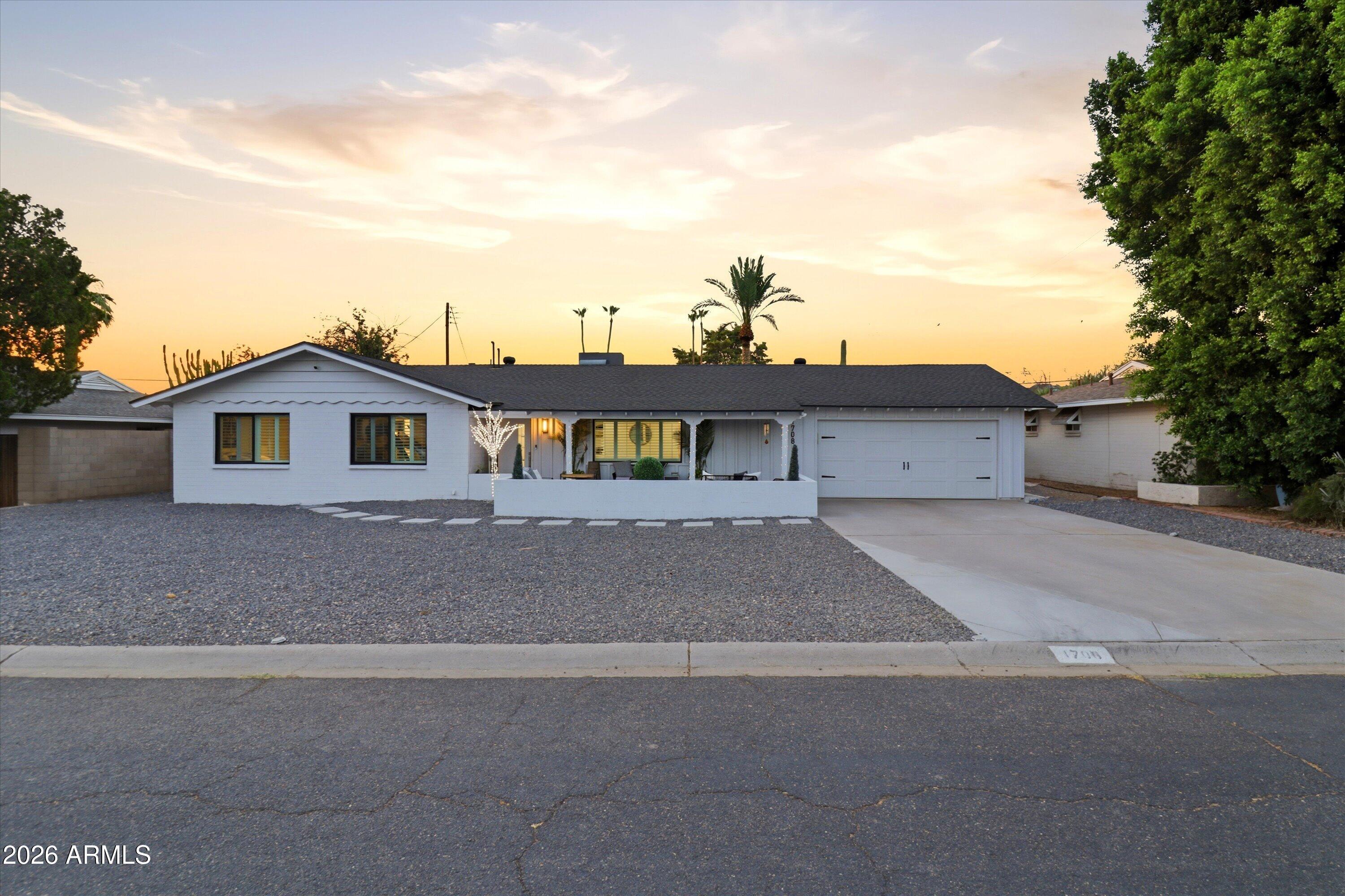 Sophisticated style meets effortless living in this beautifully remodeled ranch home on an exceptionally quiet Central Phoenix street with gorgeous mountain views. Thoughtfully redesigned with a complete remodel, this home offers 3 bedrooms plus a dedicated office, an expansive living room, two fireplaces, and designer finishes throughout. The stunning kitchen features a waterfall island and opens seamlessly to the main living spaces, creating an ideal layout for everyday living and entertaining.

Step outside to a professionally finished backyard with a sparkling diving pool, artificial turf, and desirable North/South exposure. Located in the highly acclaimed Madison School District, just minutes from Piestewa Peak, the Biltmore, and favorite local dining destinations including Richardson's and Rokerij, this home offers the perfect blend of luxury, comfort, and location.