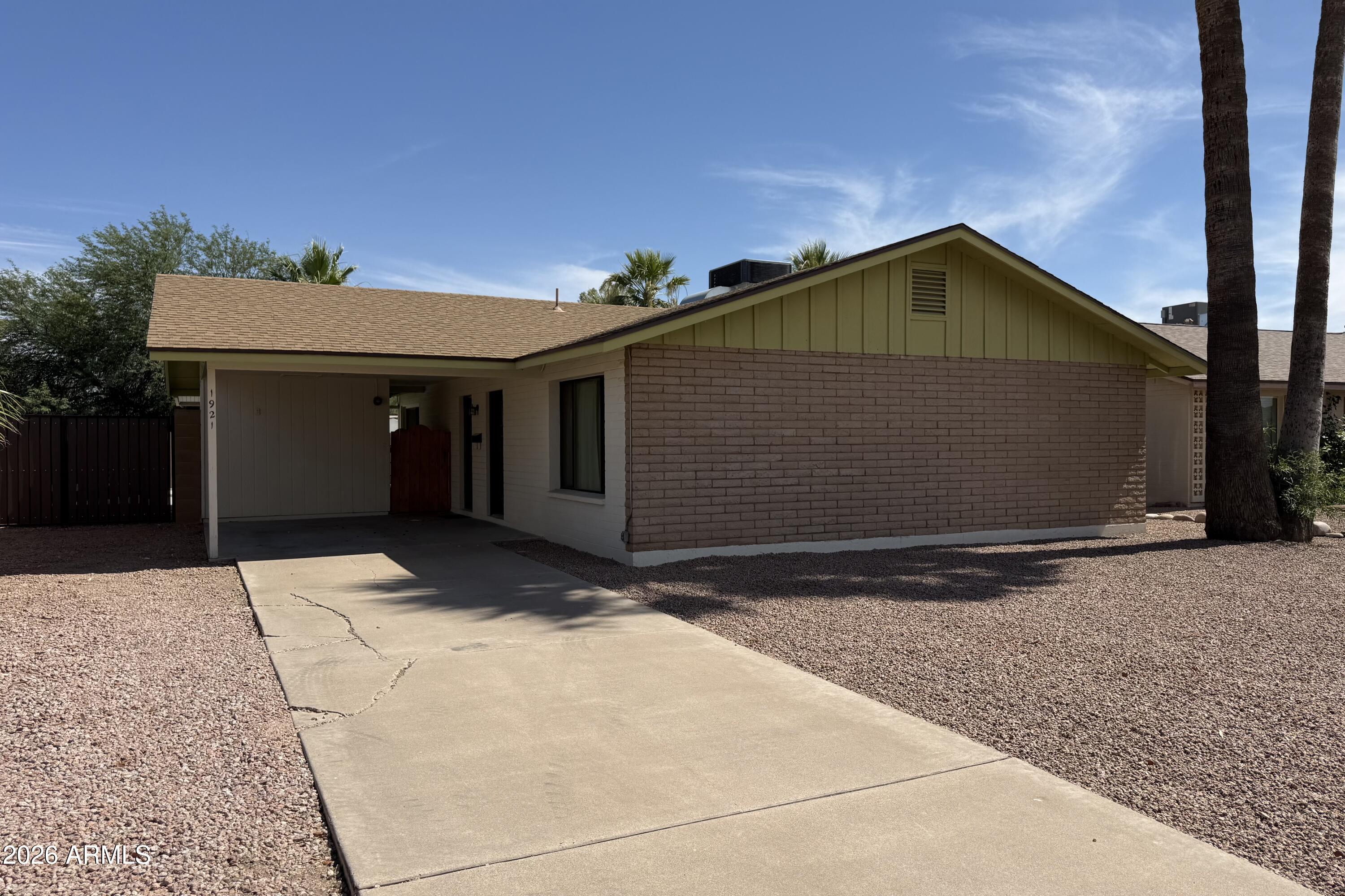 Beautifully remodeled single-level block home in an established Tempe neighborhood -- and NO HOA! This move-in-ready 3-bedroom, 2-bath gem has been thoughtfully updated throughout. The renovated kitchen showcases new cabinets and quartz countertops, paired with fresh tile flooring that carries throughout. Both bathrooms have been tastefully renovated, and the big-ticket items are handled -- newer windows and a replaced roof. Out back, enjoy your private retreat: a refinished diving pool with a new energy-efficient pump, filter, and pool plumbing, plus an RV gate for your toys, trailer, or extra parking. Easy single-level living with covered carport parking and an unbeatable location just minutes from ASU, McClintock High, shopping, and the US-60, 101 & 202 freeways.