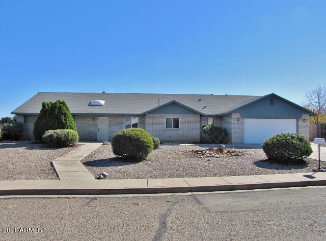 This spacious, 3BR+2den/2BA/2CG, 2657 sq.ft. home w/swimming pool & spa is centrally located in Sierra Vista, AZ minutes from Ft. Huachuca, shopping, schools and Canyon Vista Medical Center.  The home has  two living areas, three bedrooms and two dens / study that could be used as separate bedrooms.  The home has new laminate flooring, fresh paint, s/s kitchen appliances and central A/C.  The large backyard includes a swimming pool and spa, a large storage shed and fruit trees.  Call today.