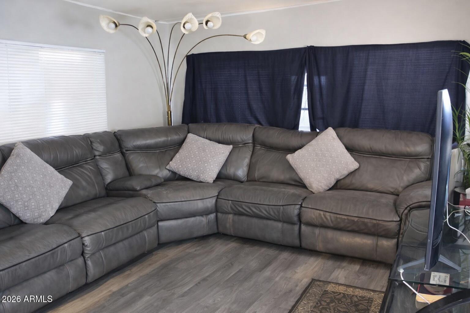 Welcome to your new retreat in this gated adult community, offering comfort, convenience, and style! This beautifully maintained 2-bedroom, 1 bath home features a fully upgraded kitchen with modern finishes, perfect for cooking. The remodeled bathroom adds a touch of luxury with updated fixtures and a clean, contemporary design. This home features a newly installed mini-split in the living room and private window AC in the primary bedroom. Enjoy a relaxed lifestyle with community amenities like pool, workout center and clubhouse . Whether you're looking to downsize or enjoy a low-maintenance living space, this home has it all — move-in ready and waiting for you!