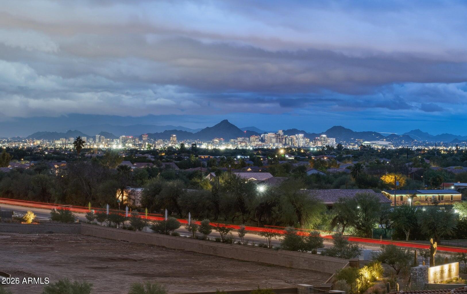 ONLY 63K PER ACRE!!! Elevated desert lots with sweeping panoramic views of city lights and surrounding mountains! Wake up to breathtaking sunrises over the Superstitions and unwind with stunning sunsets over the Estrella's. The South Mtn Preserve is literally your backyard, offering endless hiking and natural beauty right outside your door. Perfectly situated in a central location -- just minutes from the East and West Valley, major freeways, Sky Harbor Airport, downtown Phoenix, and ASU. Two separate parcels are included, each with convenient access. Build your dream home and enjoy peace, privacy, and the feeling of being far from the city -- while staying close to everything. Spacious lots like these, with incredible mountain and city views, are rare. No HOA! 2 lots