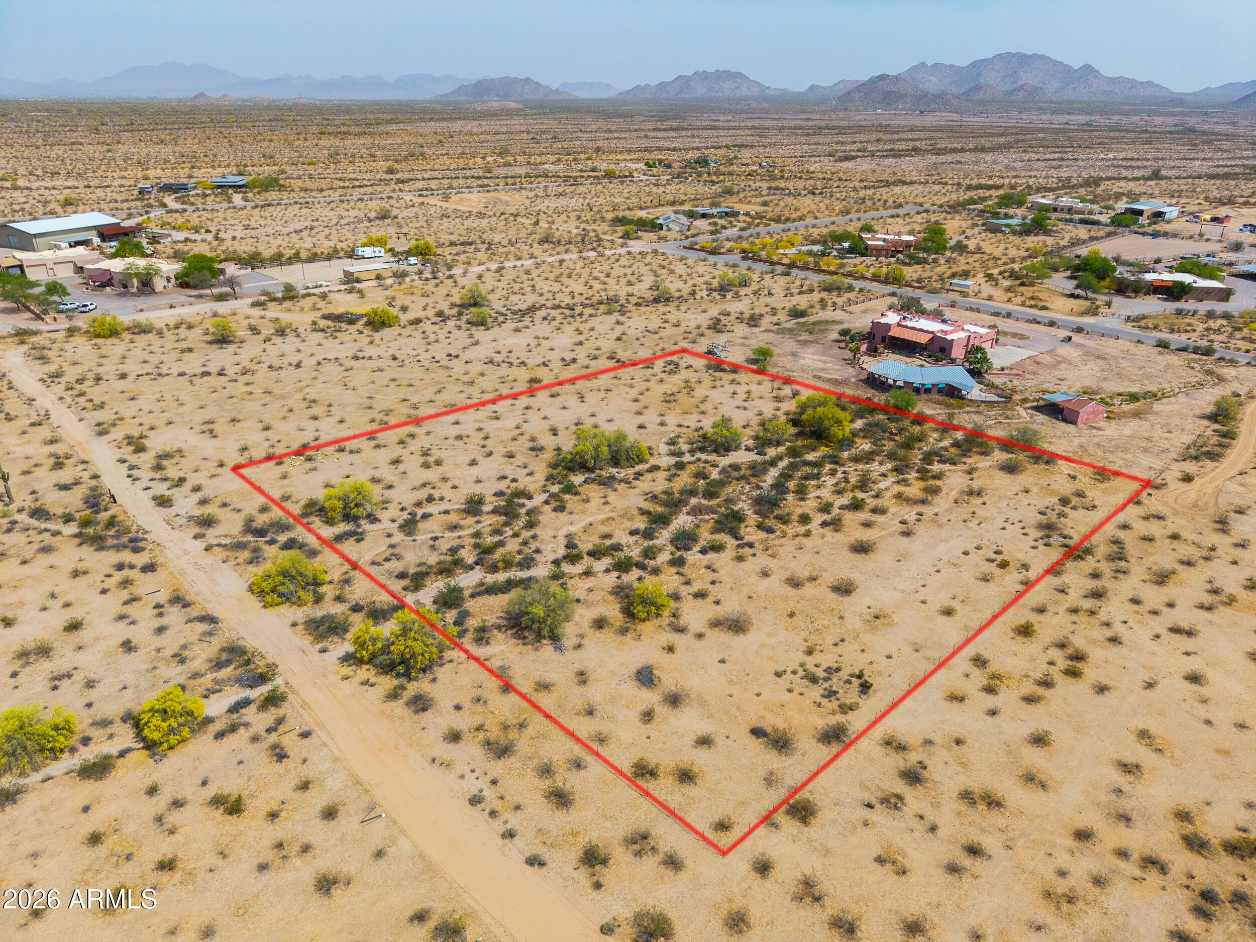 Secluded 2.3 acres with gorgeous views and very peacefully.  Electric on Chinook.,  No water would require a well to be drilled. Very nice custom homes in the area.  Short drive to town and easy access to I-10 to Phoenix or Tucson.