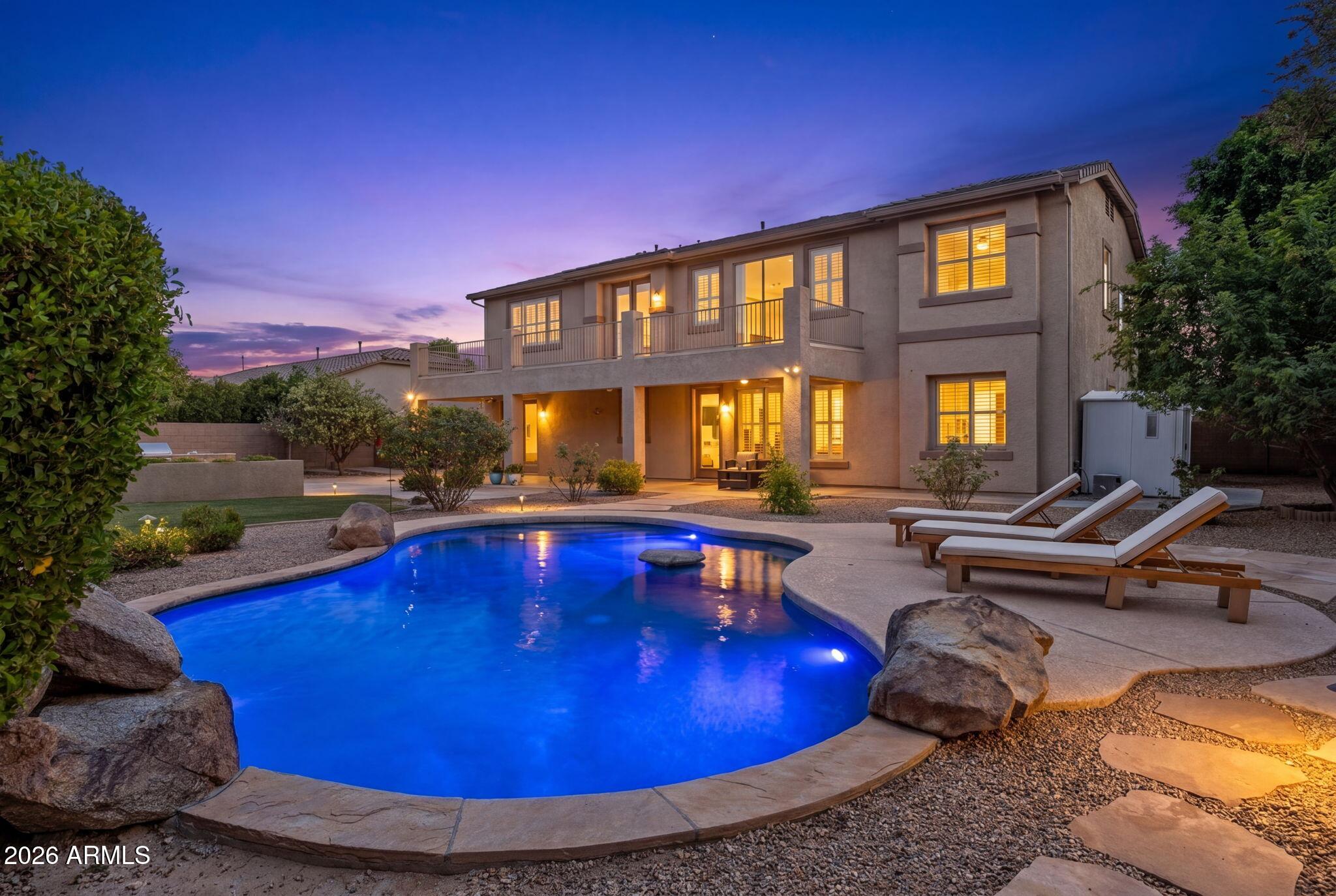 Welcome to Castillo I, one of the most sought-after streets in Seville Golf & Country Club. Set on an oversized 18,000 sf lot, the backyard features a sparkling pool, built-in BBQ, storage shed, RV gate with usable storage space, mature trees, no rear neighbor, w/ plenty of room to relax and entertain. A 3-car garage plus extended driveway provides ample parking for residents and guests alike. Inside, you'll find soaring ceilings, plantation shutters, fresh interior paint, formal living & dining spaces, a private office, and a full downstairs guest suite w/ en-suite bath. Upstairs a huge loft w/ balcony, and a spacious primary retreat complete with its own sitting area. Top rated Chandler School District, this premier neighborhood has everything you've been dreaming of.