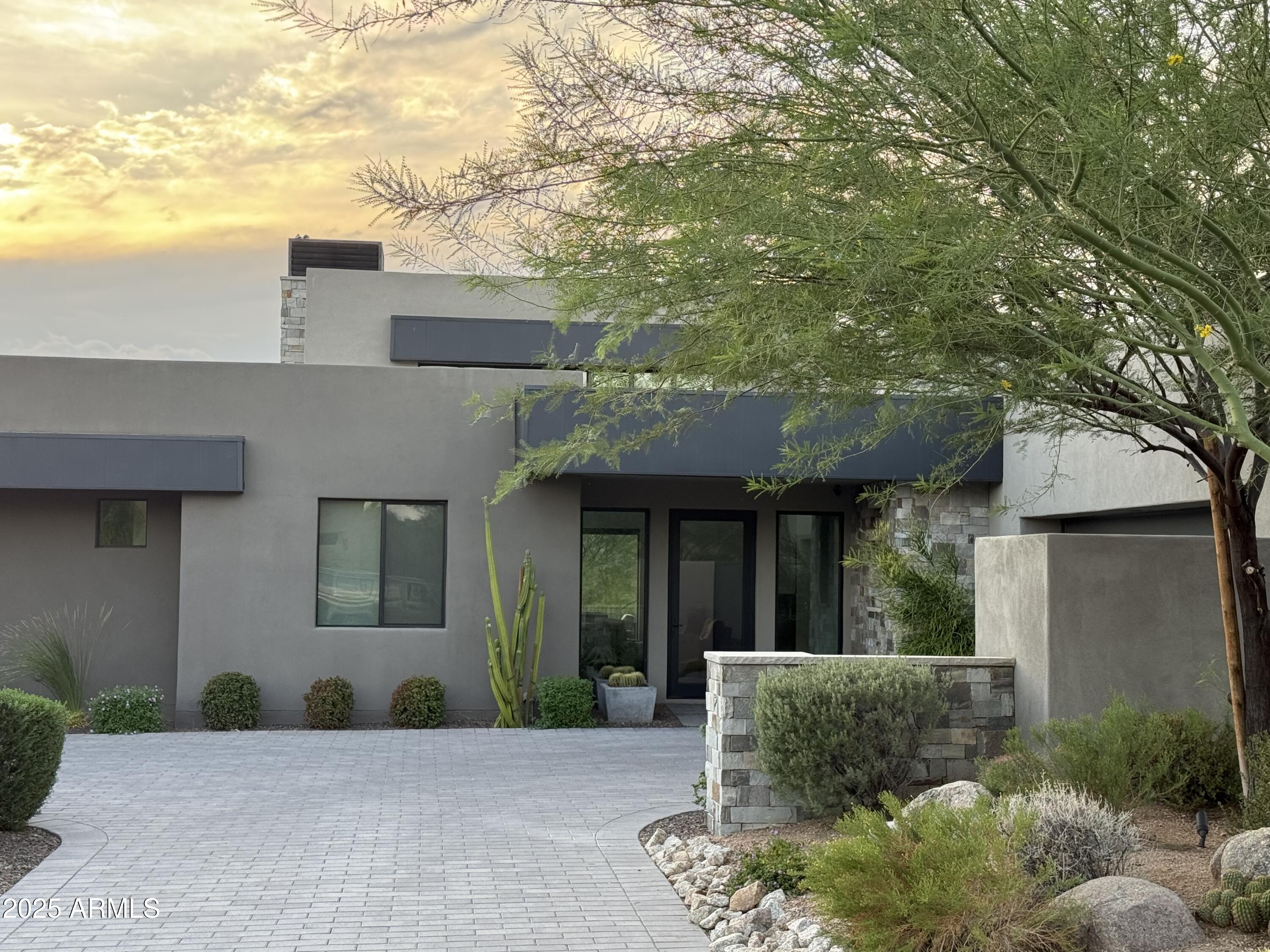 Extraordinary Mortensen Signature Home nestled on a corner lot in acclaimed Desert Mountain boasting mountain, Apache Peak and sunset views. No details were spared or features overlooked.  This soft contemporary home is distinct, stylish and comfortable. Gracious indoor-outdoor living with pool, spa, covered veranda provide fabulous lounging, grilling and dining areas.  Stone patios and a grand entrance complete this stunning home. Golf Membership to the Desert Mountain Club is available to transfer at COE.