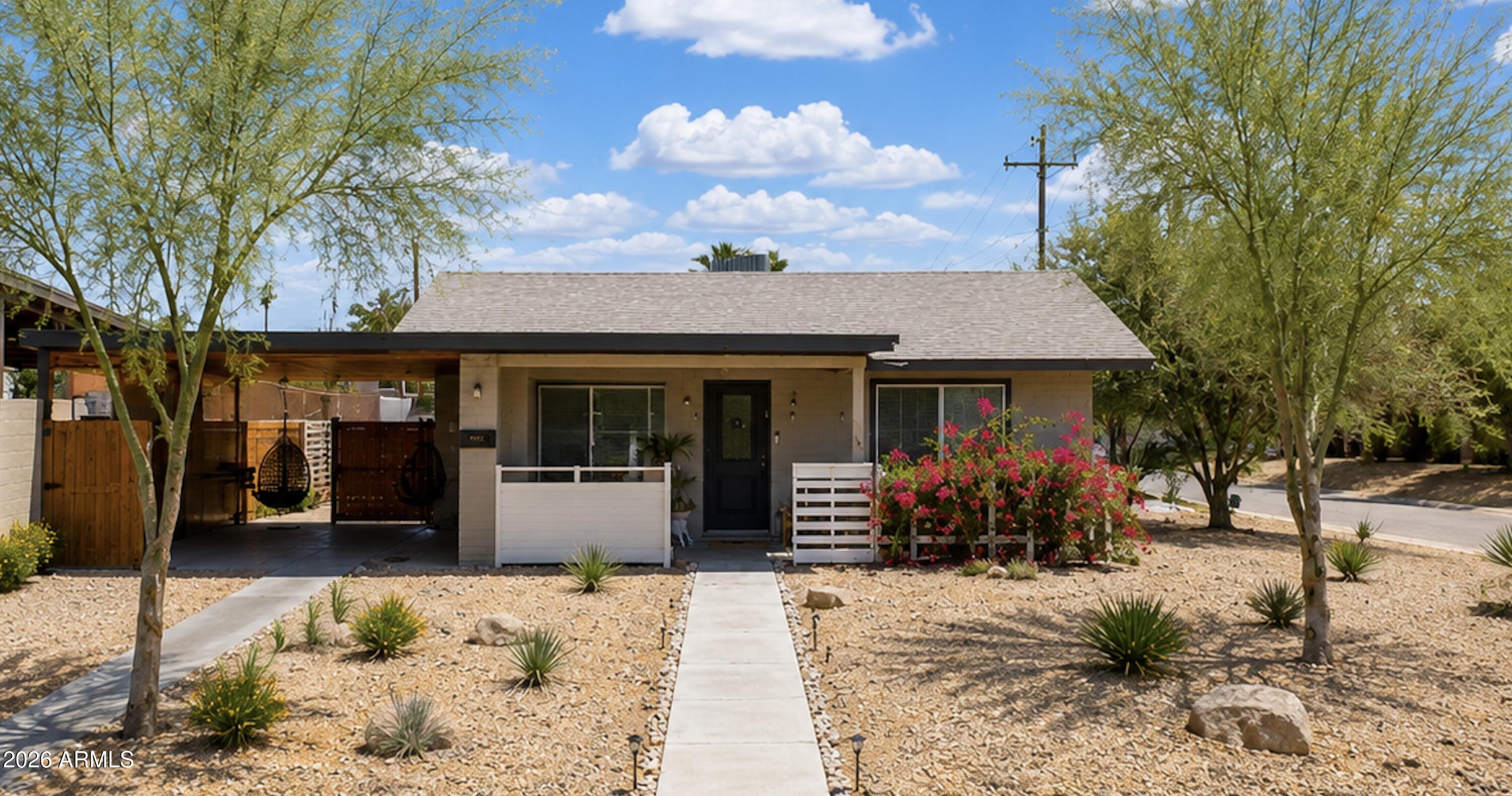 Step into beautifully updated mid-century charming home nestled in the heart of Historic Phoenix minutes from downtown. This 3-bed 2-bath single-level home features a master split floorplan and invites you to experience a unique vintage character paired with modern comfort on a 7,118 sq ft corner lot. Historic Charm meets modern efficiency. Built in 1950 but fully updated with today's standards:  new roof and energy efficient windows, new AC, a contemporary kitchen with an island, white cabinetry and quartz countertops, vented hood, stainless steal appliances, freshly painted interiors, new tile plank flooring throughout with carpet in bedrooms. Outdoor potential: Generous size lot offers multiple outdoor living opportunities, build covered patio, extend for mo SF or add ADU. Charming curb appeal, Location & Lifestyle. Short drive to the airport and freeways, in the heart of Phoenix.