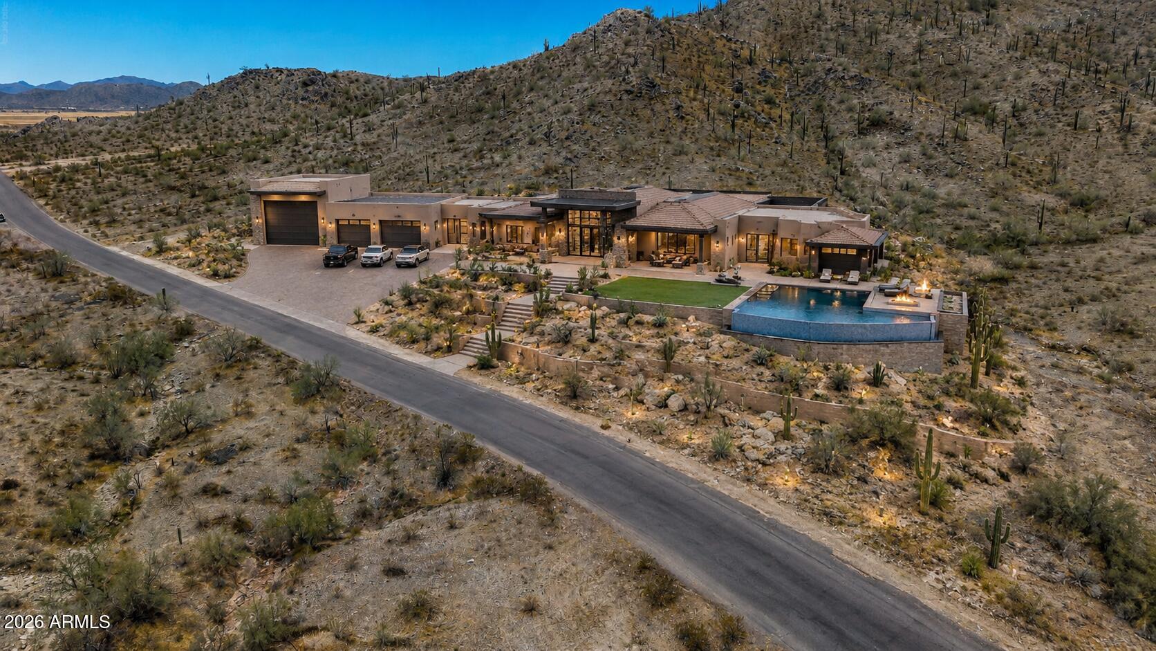 Exceptional 10.5 acre homesite just outside Maricopa offering mountain views, privacy, and the freedom to create your ideal desert estate, custom home or desert compound. Significant site work has already been completed, including a professionally engineered building pad with approximately 15,000 cubic yards of engineered fill and a completed driveway saving substantial time and expense. Power is nearby, with ample room for a custom home, guest house, horse facilities, RV garage, workshop, collector car storage, or recreational amenities. No HOA restrictions. Located just minutes from Apex Motor Club and a short drive to Maricopa conveniences. A rare opportunity for those seeking space, privacy, and freedom. Lot is made up of two, 5.27 acre lots, sold together only.
