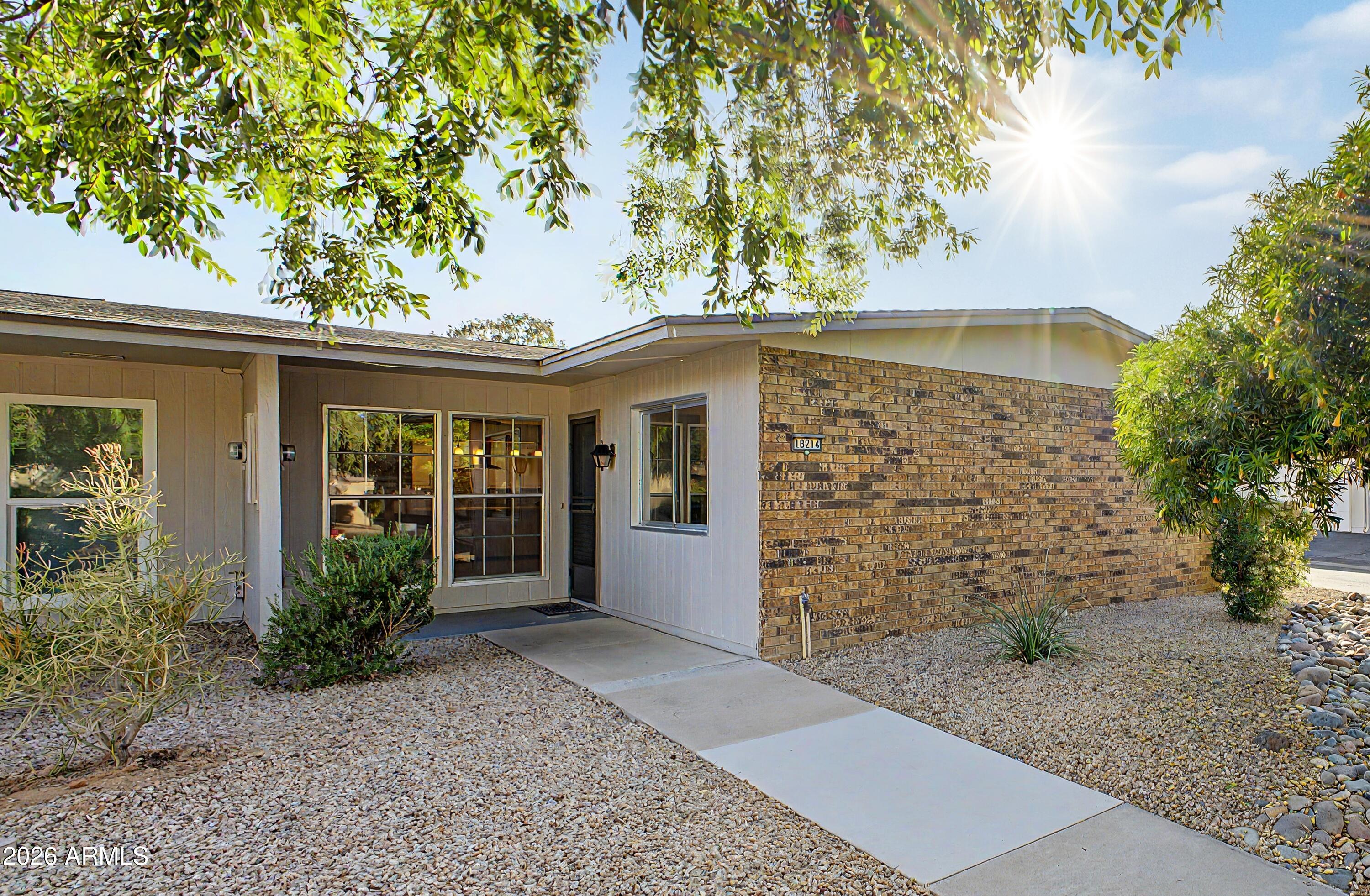 Welcome to 18214 N Opal Dr in the highly sought-after 55+ community of Sun City West! This well-maintained 2-bedroom, 2-bath home offers a spacious and functional layout with bright, open living areas designed for comfort and ease. The inviting interior flows seamlessly from the living room to the dining area and kitchen, creating the perfect space for both relaxing and entertaining. Enjoy low-maintenance living with a peaceful neighborhood setting, all while being just minutes from shopping centers, dining, golf courses, and community amenities. Experience the active lifestyle Sun City West is known for!