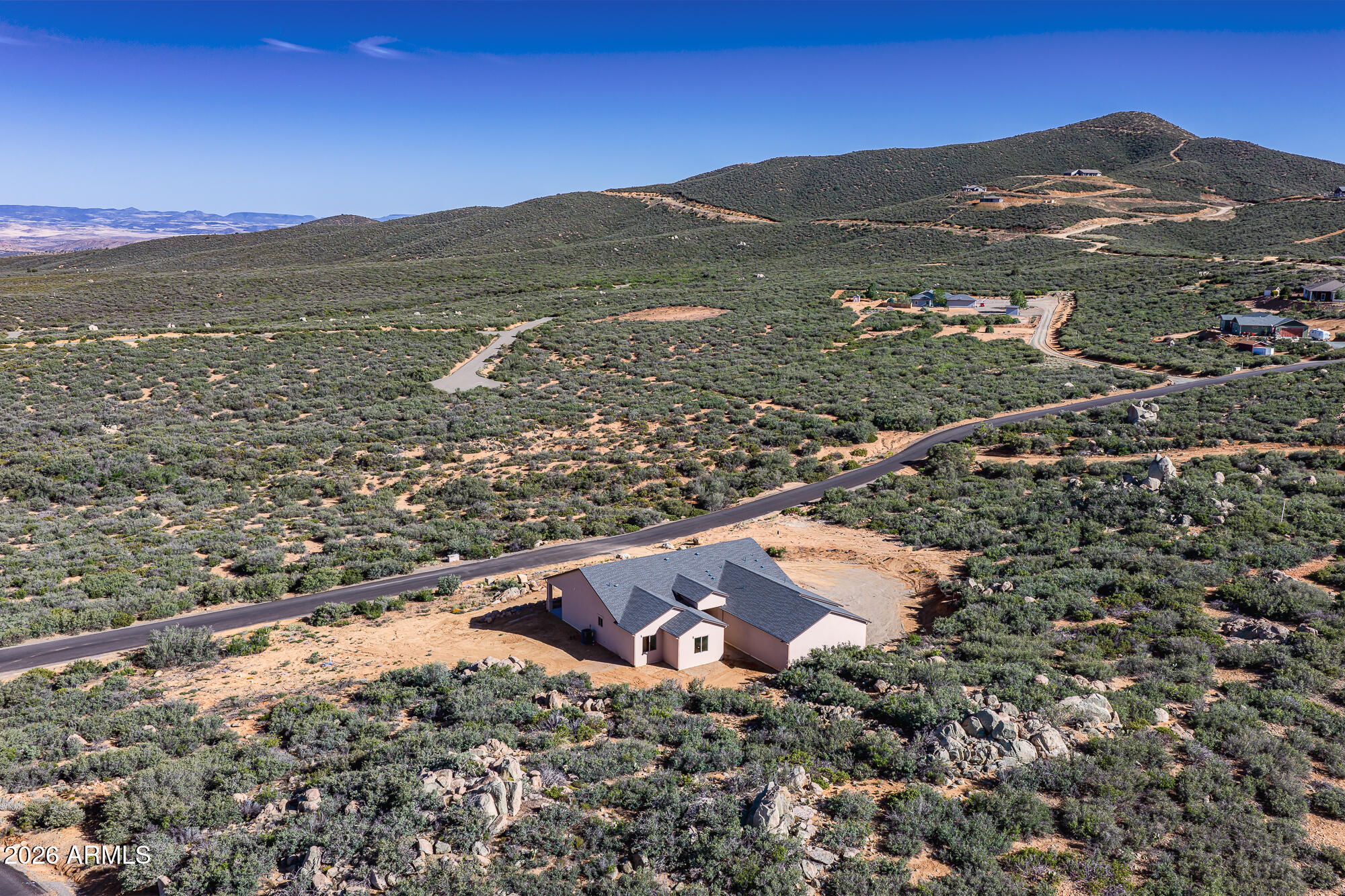 Experience elevated desert living in the prestigious Estates at Cherry Ridge where luxury privacy and breathtaking natural beauty come together combining this Beautiful Custom Home on this exceptional 2.8 acre lot. Come enjoy cooking and entertaining in your brand new spacious kitchen with huge island, brand new appliances and custom cabinets. Look outside your 4 panel window wall onto panoramic mountain views. Great room has beautiful electric fireplace and inset custom ceiling. A few finishing touches and this fantastic property is ready to move in. Paved road, huge building lots and custom homes all around form The Estates and Cherry Ridge. bedroom has an incredible master bathroom and closet. Come see this amazing home offered at the new low price. See photo