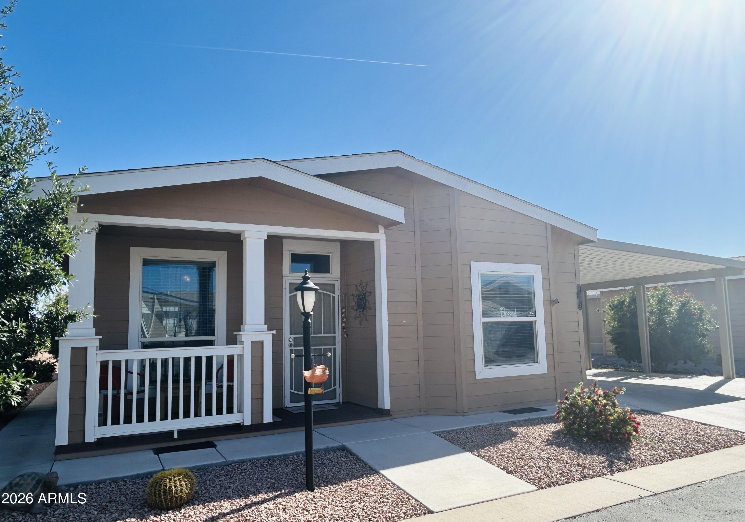 Time to view this beautiful 2019 Hme, in the sought after Dolce Vita 55+ (age qualified) resort community. Offering a 1700 sq. ft. open & bright floor plan, w/2 bds. 2 bths. Home boasts a very spacious primary en-suite. Split 2nd. bdrm & bath. for guests or an office. Kitchen is open w/island, stainless steel appliances, farm style sink, pantry & eat-in kitchen area leading out to back covered patio. Enjoy the many sunrises w/coffee & delightful sunsets here. Huge shed. Plenty of space for 2 vehicles & golf cart under carport. Quant front porch offers amazing views of the Superstition Mountains. Home is offered partially furnished. Free storage lot for trail./boats, 3 pet park areas. DVC delivers so many amenities in/outdoors. Huge htd. pool, 2 spas, fitness gym, pickleball & so much more