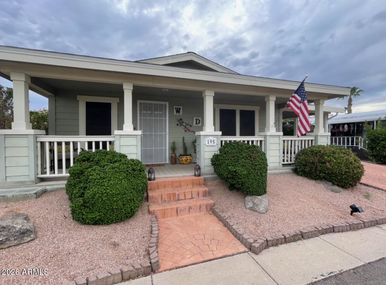 Beautifully Remodeled 2006 Palm Harbor Mfg home located in a 55+ park at Hacienda de Valencia with a stunning Casita. 2 Bedrooms, 2 full baths, covered porch in the front and covered porch on the back of the home. Quartz countertops, stainless steel appliances, laminate and tile floors throughout the home. Beautifully Landscaped.This is a Must See!