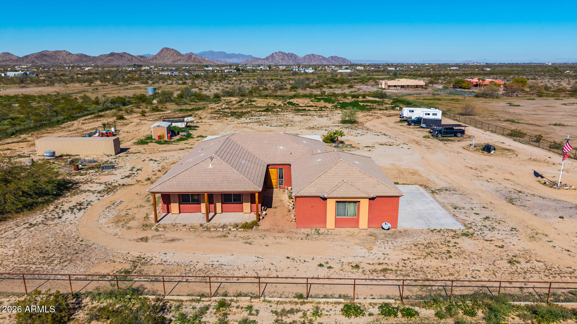 This home has EVERYTHING! Mountain views 2 miles from BLM trails. Fully fenced 3.75 acres.Electric gate at entry,extended 3 car garage to hold all the toys. 2
separate workspace/storage areas.Huge covered patio full length of the home.Step inside to extra spacious great room featuring vaulted ceilings,wood pillars and
wet bar area for entertaining.Kitchen includes large breakfast bar and separate island,granite counters.Master bedroom features huge bath,walk-in tiled
shower,jetted tub and huge master closet.2 more spacious bedrooms connected by Jack & Jill bathroom.Also a separate office/workspace.Exterior painted in 2016
with Rhino Shield paint. Whole home water filter. See the full list of upgrades/updates.Property includes the 3 total parcels 1.25 acres each.