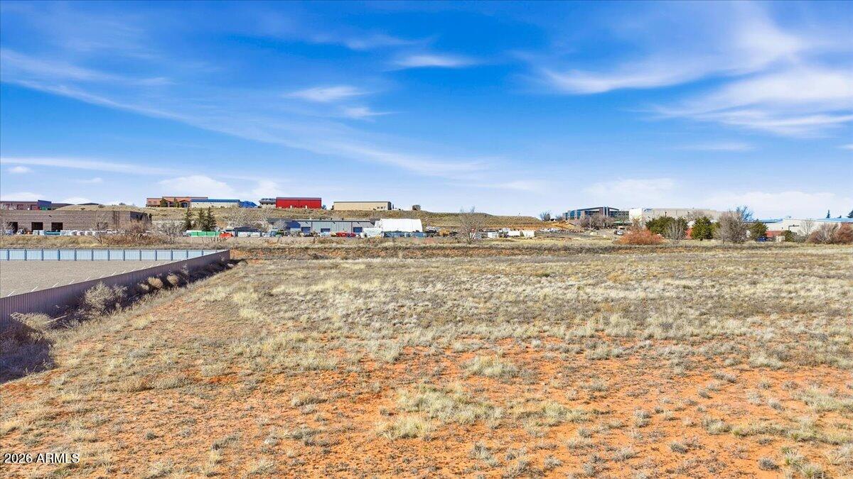 Located in a well-established and growing industrial park in Prescott, Arizona, this 2.48-acre industrial lot presents a highly functional and development-ready opportunity. The parcel is level throughout with 100% usable land, offering efficient site planning and construction. An adjoining 2.66-acre parcel is also available, providing the option to combine acreage for a larger footprint.
The property is zoned IG - Industrial General, allowing for a wide variety of industrial and commercial uses. Its central position between Prescott, Prescott Valley, and Chino Valley enhances accessibility and logistical efficiency, making it an ideal location for businesses serving the greater Quad-City area.
Utilities available to the site include APS electric, UniSource natural gas, city water/sewer and refuse, as well as CenturyLink telephone and Sparklight internet. With strong infrastructure, flexible zoning, and a prime industrial location, this parcel offers a compelling foundation for long-term commercial success.