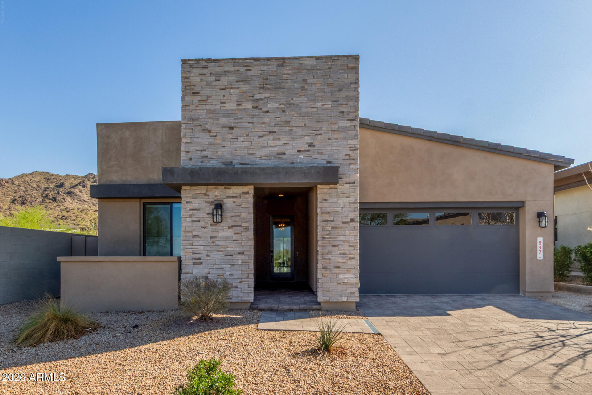 Modern desert living with resort-style outdoor space in one of South Phoenix's most desirable gated communities. Built in 2021 and meticulously maintained by its original owner, this beautifully designed single-level home offers 3 bedrooms, 2.5 bathrooms, and 2,076 square feet of modern living. The split floorplan features an upgraded chef's kitchen that opens seamlessly to the spacious living and dining areas, creating effortless indoor-outdoor flow ideal for entertaining and everyday living. The private primary suite includes a walk-in shower and generous closet space. Additional upgrades include epoxy garage flooring, built-in garage storage, garage service door access, soft water system, and reverse osmosis. Step outside to your backyard retreat complete with pool, spa, and elevated deck perfect for morning coffee or Arizona sunset evenings. Located in the gated Avance community near South Mountain trails, Downtown Phoenix, Sky Harbor Airport, and major freeways, residents enjoy access to resort-style amenities including a community pool, fitness center, parks, and walking paths. A rare opportunity to own a thoughtfully upgraded home in one of Phoenix's premier modern desert communities.