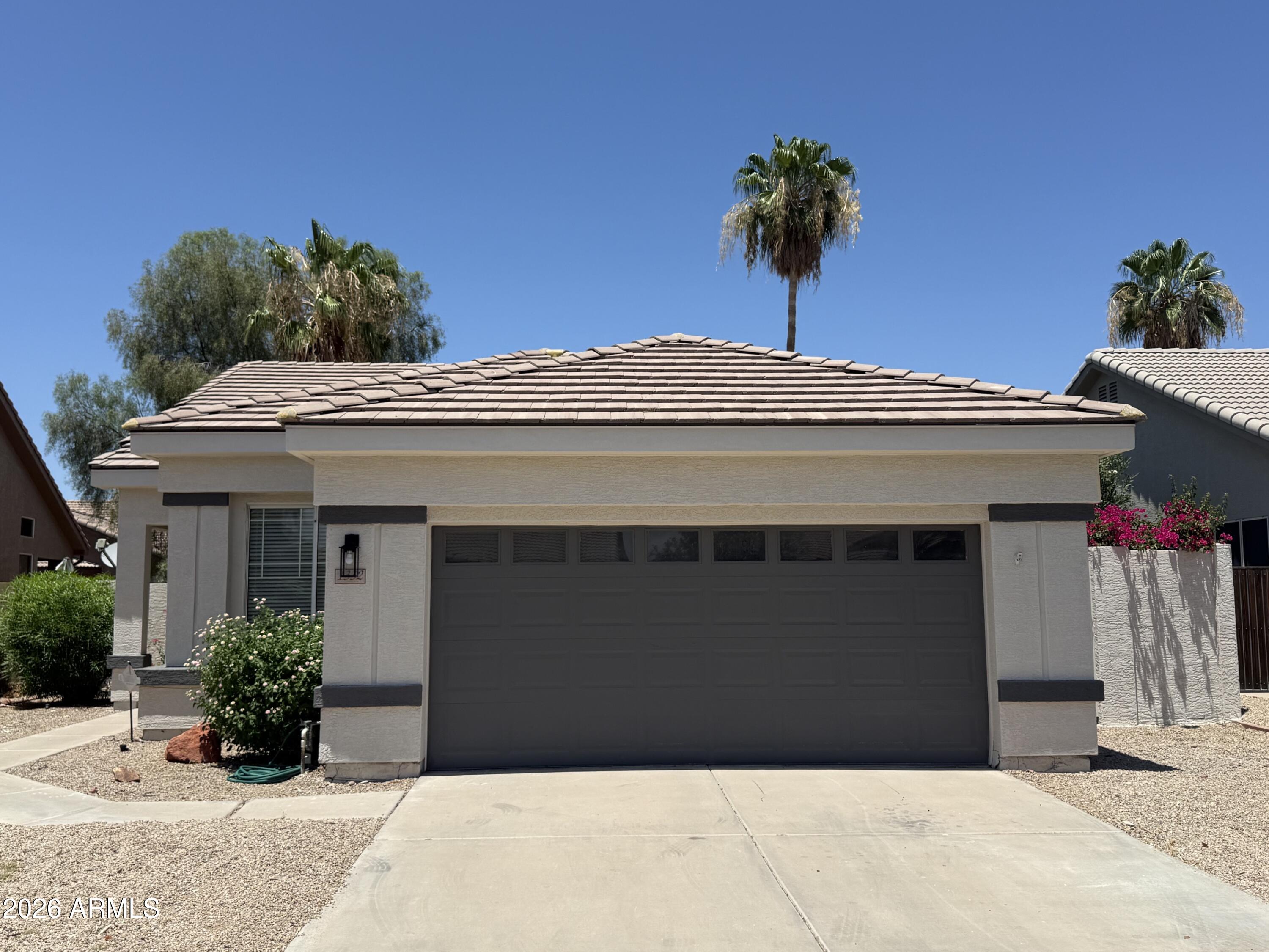 Fall in love with this beautifully updated 3-bed, 2-bath home in the heart of Chandler with new exterior/interior paint. As you step inside, soaring vaulted ceilings and abundant natural light create a warm, welcoming atmosphere. The open-concept layout flows effortlessly from the spacious great room to the stylish kitchen, featuring new granite countertops, new stainless steel appliances, a center island, and a cozy breakfast nook perfect for morning coffee. The private primary suite offers a peaceful retreat with a bay window, dual sinks, a walk-in closet, and an en-suite bath. Outside, enjoy a serene, low-maintenance backyard with mature landscaping. Ideally located near Loop 101 & 202, major employers, shopping, dining, and entertainment. Move-in ready and waiting to welcome you home.