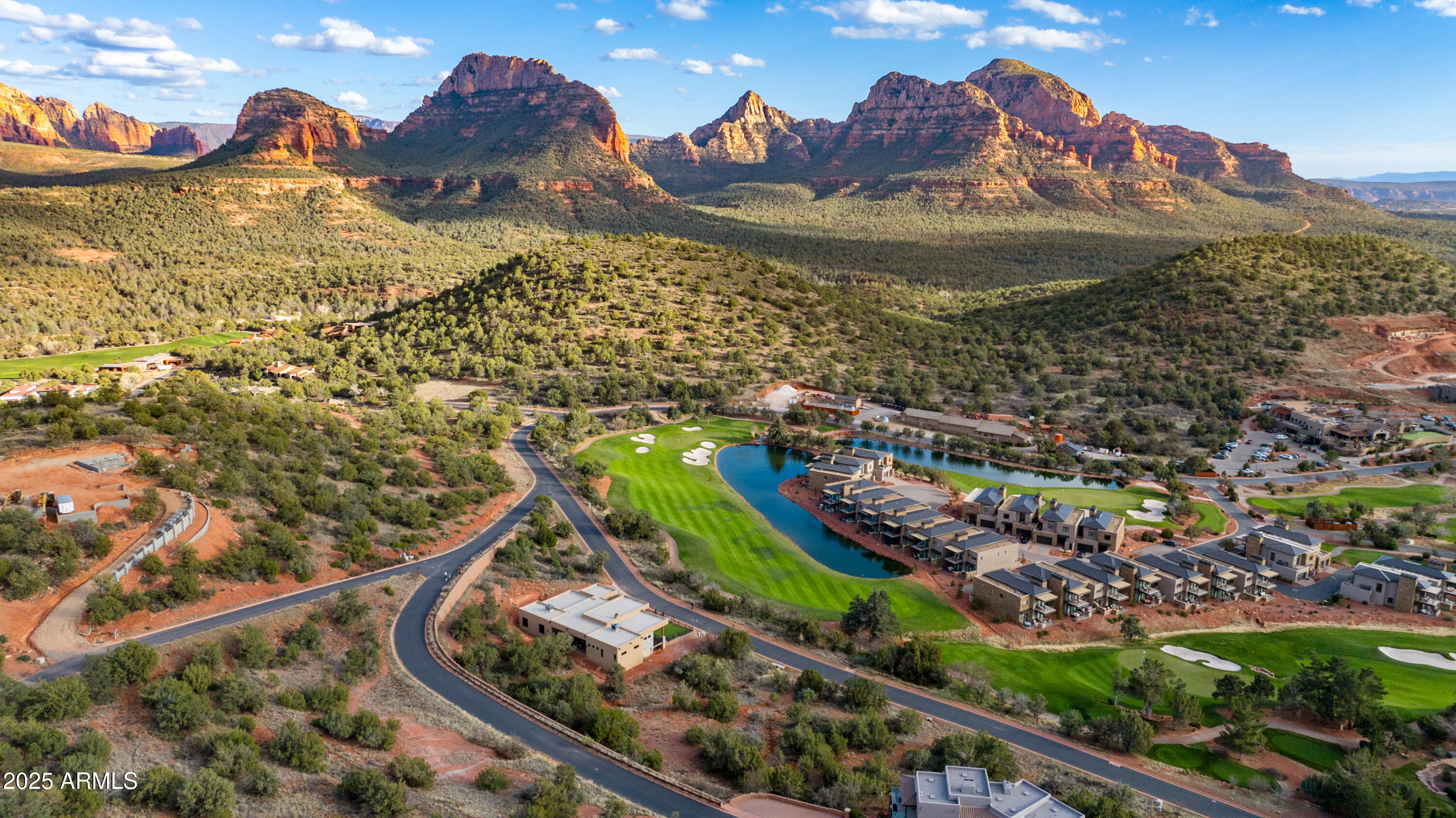 Located within the prestigious gated community of Seven Canyons.  This exclusive homesite offers an elevated position above the renowned Tom Weiskopf designed Golf Course.  Nestled adjacent to the Coconino National Forest.  You will revel in breathtaking views of the lush greens and striking red rock formations from this prime location.  Marvel at unparalleled vistas of Sedona's iconic red rocks, including Thunder Mountain, Capitol Butte, and Wilson Mountain.  You have the ideal foundation to craft your dream home.  Experience heightened security with a 24- hour guarded gate, ensuring peace of mind.   The sellers Licensed Realtors in Arizona, present this property as a potential investment for your portfolio, providing an option for those not yet ready to embark on the construction journey.