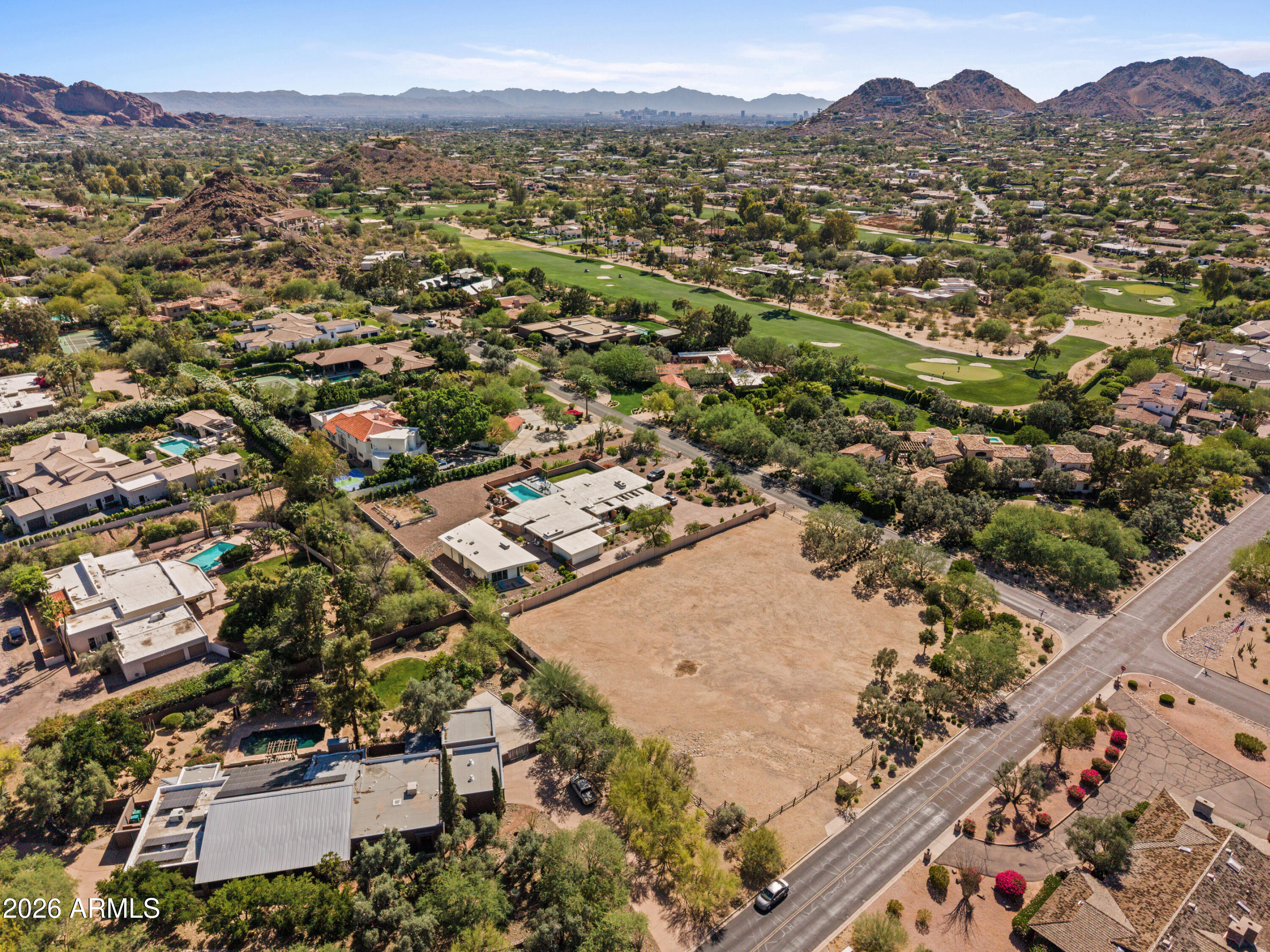 Spectacular 1.08 acre parcel in one of the most desirable areas of Paradise Valley with fabulous Mummy Mountain and Phoenix Mountain Preserve views! This is a NON-HILLSIDE lot near Paradise Valley Country Club Golf Course. The lot has been cleared of the prior home and is situated so that the backyard of the new home will have mountain views. An incredible opportunity to build your dream home on this amazing piece of land!! Call for more information.