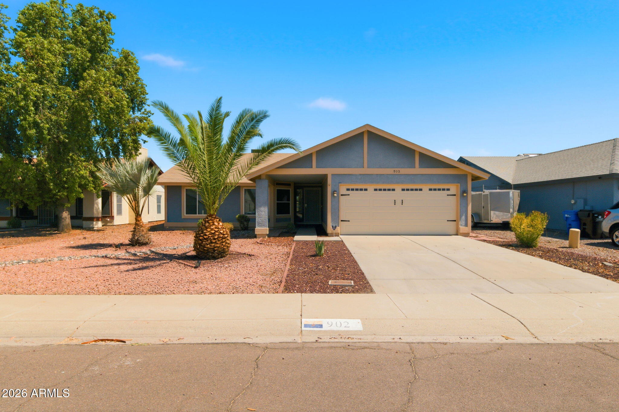 Don't miss this beautiful 3 bed, 2 bath North Phoenix home featuring vaulted ceilings, abundant natural light, brand new luxury vinyl plank flooring, new carpeting, newer energy efficient dual pane windows, fresh interior paint, & a wood burning fireplace. The spacious open concept great room, a rare feature for homes in the area, creates an inviting space for both everyday living and entertaining.

The primary suite offers dual sinks, a soaking tub, large walk in closet, and direct access to the backyard. Outside, enjoy a covered patio, sparkling pool with water feature, & a generously sized backyard with no neighbors directly behind, providing added privacy & endless possibilities for outdoor living and relaxation.

Conveniently located near Loop 101, parks, shopping, dining and majo employment corridors, this move in ready home combines comfort, functionality, privacy, and the added benefit of no HOA.