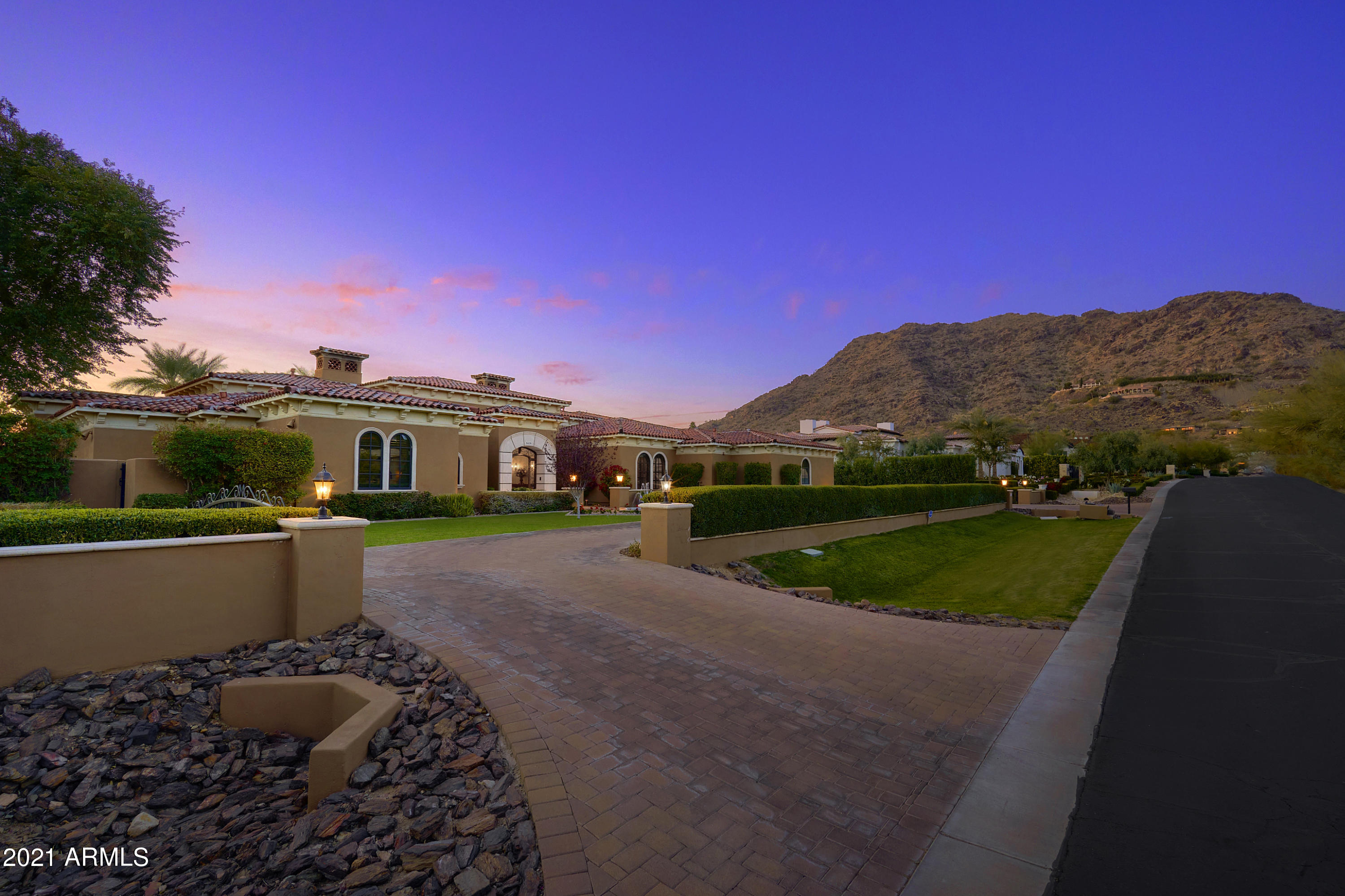 Next Level Mediterranean estate compound perched on an elevated Acre plus flat lot offering epic views in all directions. This is a one of a kind, must see estate built by Legendary Homes offers grand, expansive interiors, oversized Master, extends into its own sitting room and rich master suite finishings, limestone fireplaces, large wine cellar, pantry, wood paneled formal study, 12 person automated theater, a state of the art home management system. A generous and self contained guest house is perfect for hosting. Gated drive, 4 car garage, resort grade grounds, true entertainer amenities and top notch privacy.  Easy to show , by appointment.