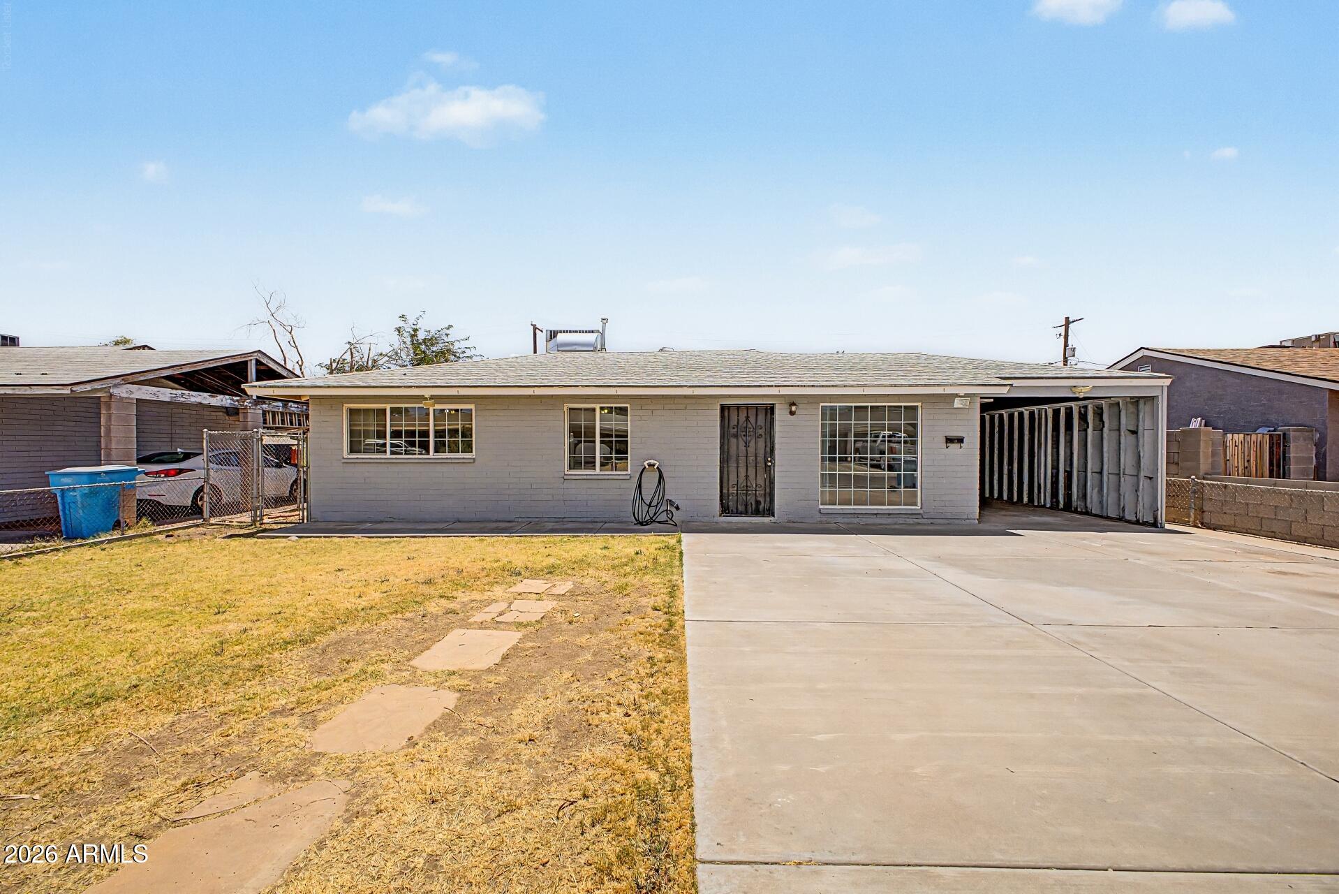 Welcome home to this charming Phoenix property offering comfort, convenience, and incredible value. Situated on a spacious lot in an established neighborhood, this home features a functional floor plan designed for everyday living and entertaining.

Inside, you'll find inviting living spaces filled with natural light, generously sized bedrooms, and a well-appointed kitchen with ample cabinet and counter space. The layout provides flexibility for families, first-time homebuyers, or investors seeking a move-in-ready opportunity.

Step outside to enjoy the large backyard with plenty of room for outdoor gatherings, gardening, play areas, or future enhancements. The property's convenient location offers easy access to major freeways, downtown Phoenix, schools, shopping, dining, and entertainment.  Brand new carpet has just been installed in all of the bedrooms, and the backyard has a concrete slab for RV parking.

Whether you're looking for your next home or an investment property with great potential, this Phoenix gem is one you won't want to miss.