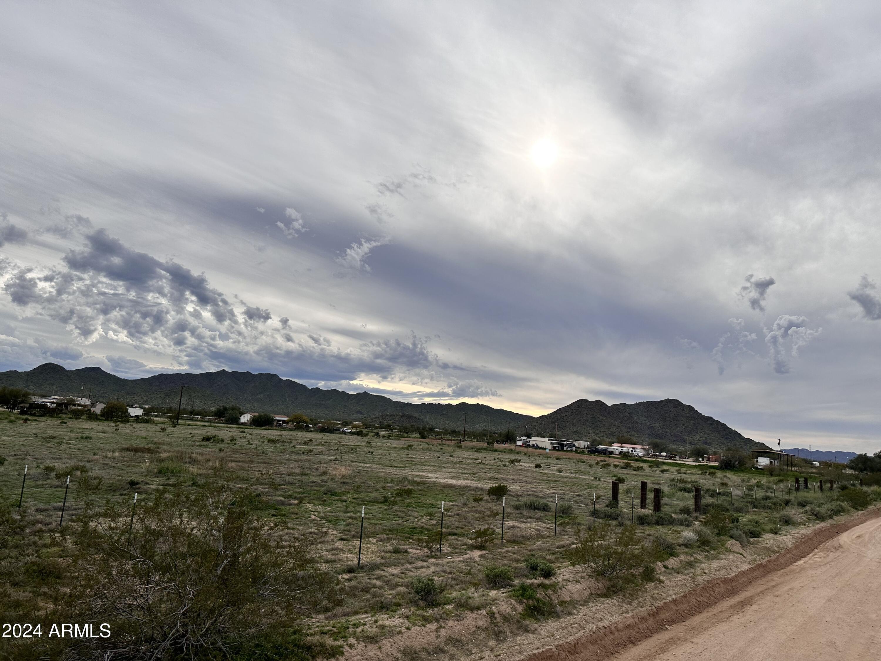 3.3 ACRES!!!!  Perfect to build your dream home and get away from the busy city lifestyle. Property already has fence all around with not one but 2 RV gates.ED-3 provides the electric. Just 20 minutes from shopping, entertainment, New Multi-generational & Aquatic Center & Regional park and Ak-Chin entertainment center. 40 minutes to Phoenix makes this an ideal property to consider.