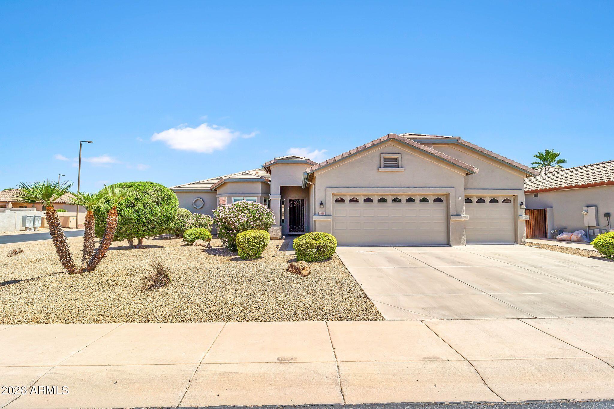 AMAZING home! Enjoy sunset views from both private front and back yards in Springfield Lakes Gated Resort Community. This unique Solera model features a 3-car garage, large family room, 3 bedrooms, 2 baths, plus a den/dining room. The spacious kitchen offers a breakfast bar, nook, cherry cabinets, granite counters, and newer appliances. Additional highlights include a full patio, low-maintenance landscaping with New drip system, front and back, Newer HVAC, Water heater, Soft water, Garage storage, and a Corner lot with only one neighbor. Residents will love access to the great recreational facilities in gated Solera.