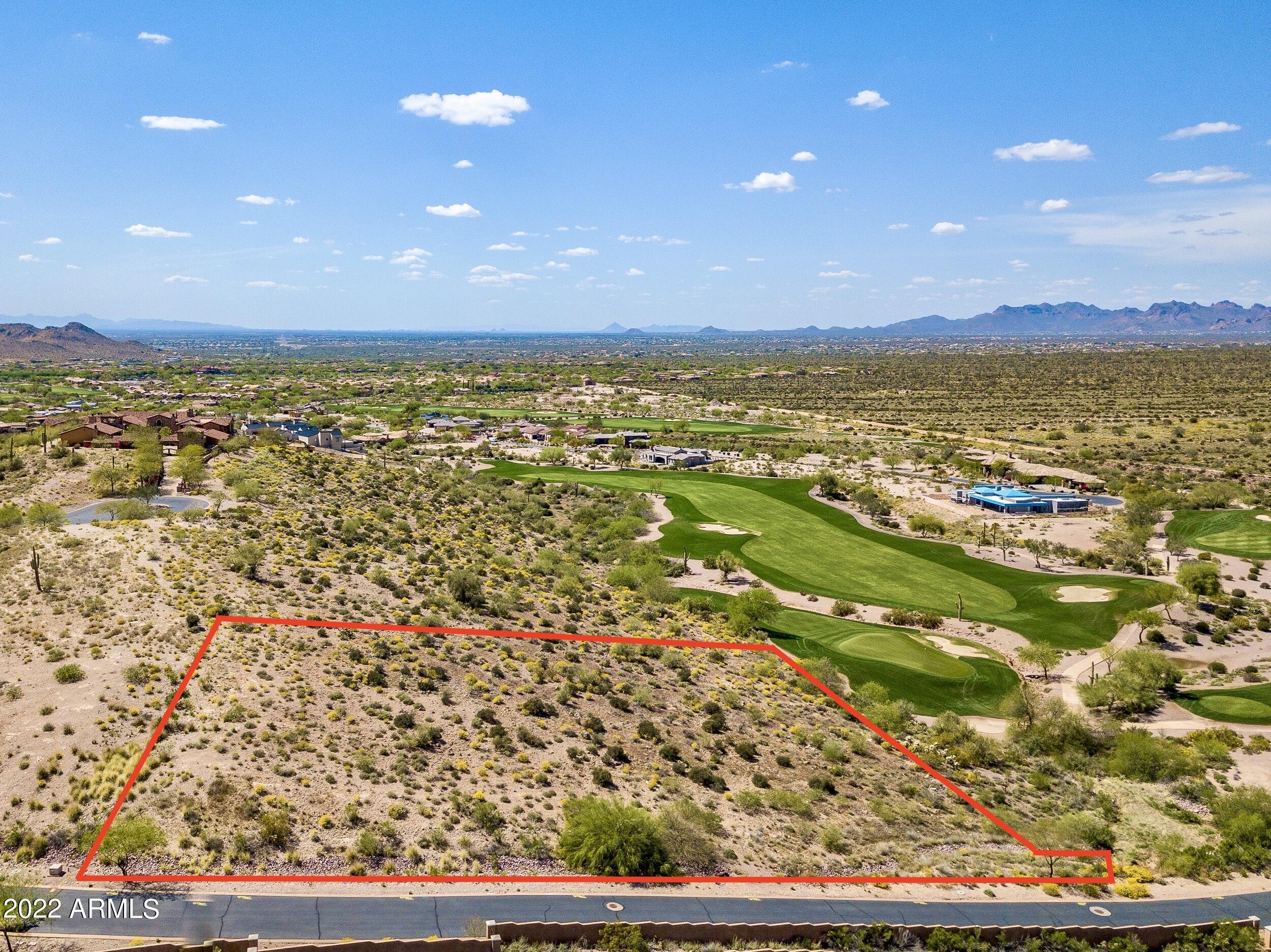 Where Eagles Dare! Superstition Mountain Golf & Country Club: a premier Lyle Anderson private/gated community w/36 holes of Nicklaus designed golf. An incredible hillside/hilltop opportunity on 1.5 acres overlooking unobstructed views of the Superstition Mountain range, the Usery Mountains, Tonto National Forest & unlimited vast open spaces of State Trust Lands. Renderings show herein are only for reference purposes & are not available for sale or as an option. Golf course frontage w/elevated views of 3 golf holes w/building area 57' above the golf course below. City light views & far distant mountain range vistas. Neighborhood of estate homes up to $5M. Without question, one of the best 'view' opportunities in the community & entire East Valley. Golf membership  under separate agreement. Only 35 minutes from Sky Harbor & 20 minutes from Williams Gateway. Exacting design standards for custom homes lends itself to the opportunity for lasting values,