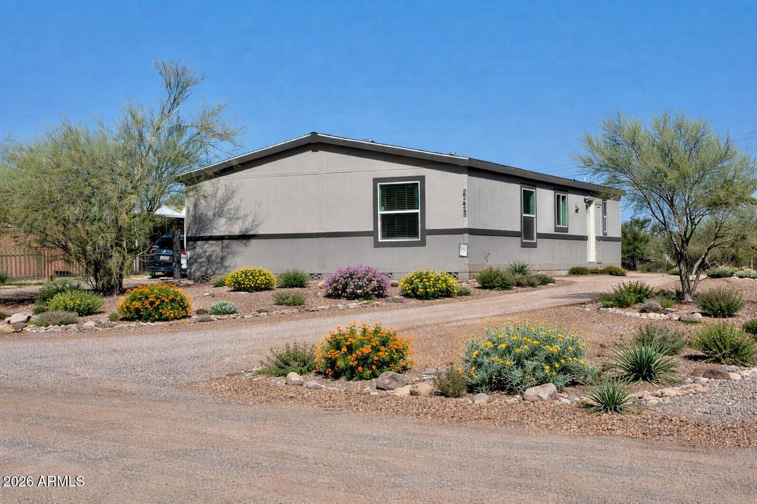Brand-new move-in-ready home with NO HOA. This beauty offers an inviting split floor plan with modern touches and colors. Lots of windows fill the home with natural light. The kitchen features an island with extra storage, pantry, sleek counters, fridge & dishwasher. Enjoy an oversized laundry room with access from both the kitchen & primary bath for added convenience. Primary suite includes dual sinks & walk-in closet. Blinds on the windows and decorative paneled doors.  Ask about up to 6% seller-paid incentives to use for closing cost or towards landscaping.  NOTE: First photo shows AI generated landscaping.