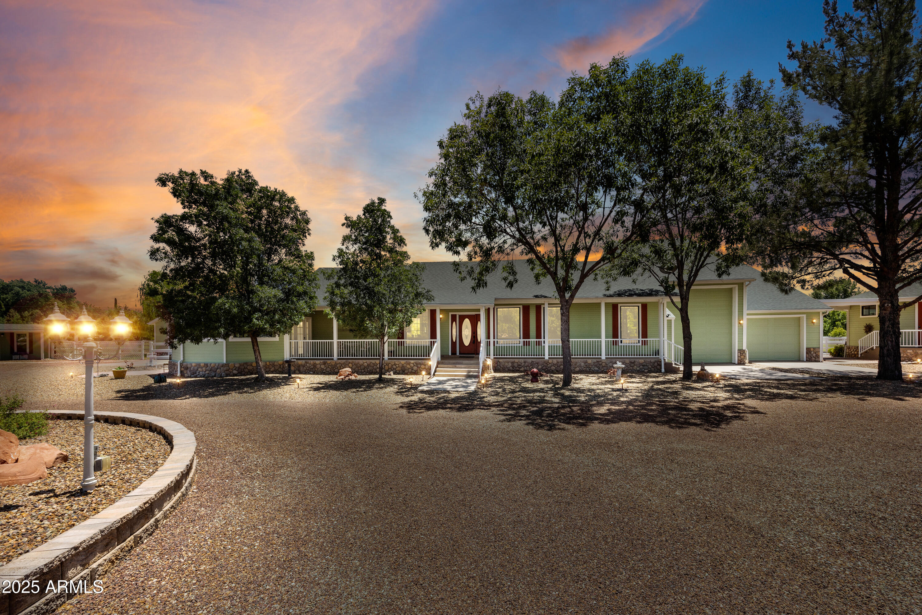 Stunning, Unique Property with guest house or separate office, a detached Studio. It's own exercise room and a separate quilting room. It is located adjacent to Rio Verde Ranchos, without the Hoa restrictions. Secluded setting that includes beautifully manicured landscaping, a 12' 5'' x 50' RV Garage (possible 6 cars), perfect for Car collectors, plus a detached two car garage and RV dump. Remodeled kitchen with Sub-Zero refrigerator, induction Wolf cooktop stove and Wolf Convection Ovens with a bun warmer, and Knotty Alder cabinets. See the attached document for complete upgrades and features like a new roof in 2019, a new tankless water heater, a Guest house added in 2014, and a Main house renovated in 2015, Installed in 2026: Remote  powered electric window shades throughout main house
