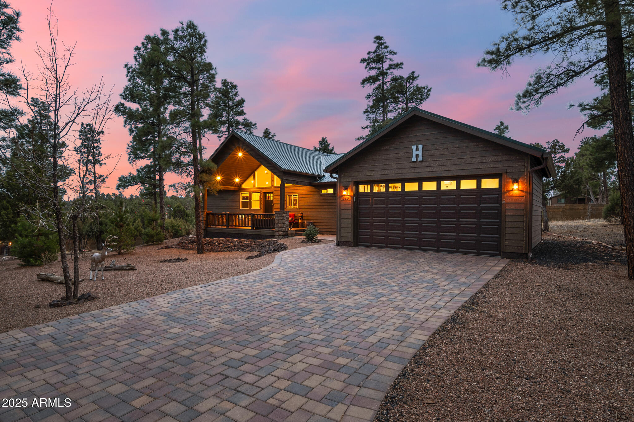 Welcome to this stunning, low-maintenance home nestled in the highly sought-after gated community with a golf course''The Retreat at Bison at Crossing'' located in the heart of Show Low, AZ. This beautiful home is designed for both comfort and style, featuring exquisite granite counter tops, Butler Pantry, gorgeous cabinetry throughout, luxurious vinyl flooring and no carpet to worry about! With its bright, open layout, this home offers the perfect balance of modern touches and functional space. Step outside to your serene, fully landscaped fenced backyard, where you'll find a private retreat perfect for relaxation or entertaining. The front and back covered decks offer ample outdoor living space, while paver walkways add charm and elegance to the property Enjoy the convenience of a detached two-car garage with paver driveway. Only 4 yrs young, this home blends modern features with the tranquil, easy-care lifestyle you've been dreaming of. Don't miss the opportunity to experience this gem in Show Low, where beauty and convenience meet in perfect harmony.