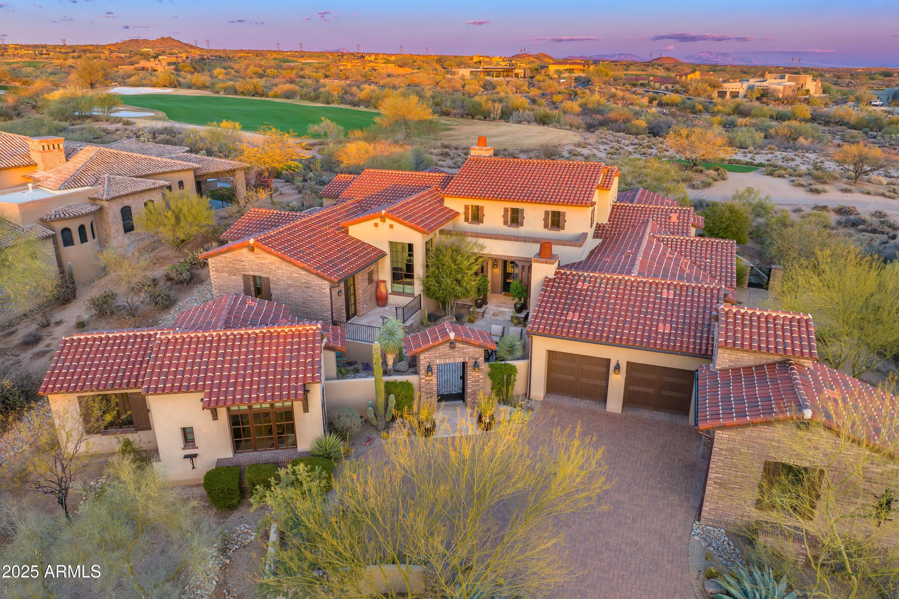 COVETED GOLF MEMBERSHIP AVAILABLE. '' Subject to club approval. Best Mirabel value! Modern Classic Spanish Colonial-Style that blends with the desert setting. Light & Bright with high ceilings. Located on the #1 hole of the Tom Fazio designed Mirabel Golf Course. Walking distance to the clubhouse & amenities with panoramic views, large front courtyard w/fireplace. Single level with only 3 steps. 5050 sf, 4 BR's, 4.5 BA's. Included is a detached 2-room Casita w/kitchenette, plus Den+Office+3 Car Garage. 2 EnSuite BR's in main house plus primary. Open Greatroom floorplan with soaring ceilings, beams & seamless indoor/outdoor living. Interior details include wood plank & custom brick plus stone flooring,  custom cabinetry. Chefs kitchen with Wolf 6 burner range .. 48" Subzero Fridge/Freezer, Bosch dishwater and walk in pantry. Walnut butcher block island & granite counter tops. 500 bottle wine room. Outdoor living area features a large cvrd patio, dining patio, heated pool/spa, fireplace & built-in BBQ station. Additional bonus items include Canterra metal front gate & courtyard gate, electric shades throughout, Savant home automation system plus custom metal air returns and vent covers. Furnishings available by separate Bill of Sale.
