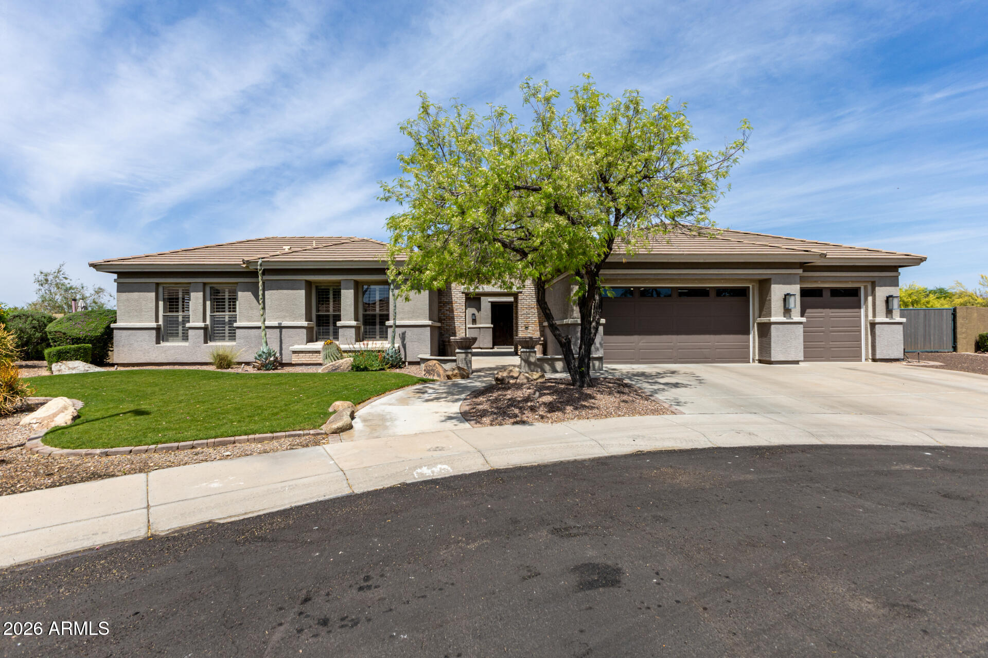 Discover resort-style living in this well-maintained, single-level 6 bed/4 bath (or 5 bed plus Office/den) home on one of Anthem's largest cul-de-sac lots. North facing rear yard. Enjoy mountain and desert views, an updated interior with many updated finishes, a pool, covered patio, outdoor kitchen slab with utilities ready for kitchen installation. RV gate (with full size gate) access with a large slab / sports court and kid zone. The oversized 4-car garage includes epoxy floors and built-in cabinets. Backs to desert wash.  Listing Agent is a licensed RE Broker in AZ.