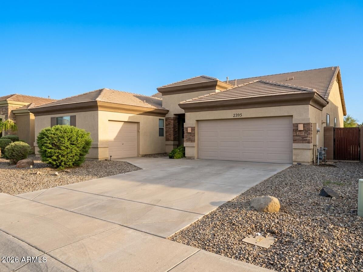 Over $50,000 built in equity. Seller assisting with concessions. Welcome to this highly sought-after Peterson Farms! This beautifully maintained Chandler home offers 2,149 sq ft with 3 bedrooms, 2 baths, a den/optional 4th bedroom, and a spacious 3-car garage. Situated on a premium oversized lot with no rear neighbors, this home offers privacy, open views, and exceptional curb appeal. Inside, enjoy an open-concept split floor plan with soaring ceilings, upgraded flooring, fresh interior paint, updated lighting, and abundant natural light. The chef's kitchen features upgraded cabinetry, Corian counters, newer appliances, and a large island perfect for entertaining. Minutes from Loop 202, top-rated Chandler schools, shopping, dining, and major employers.