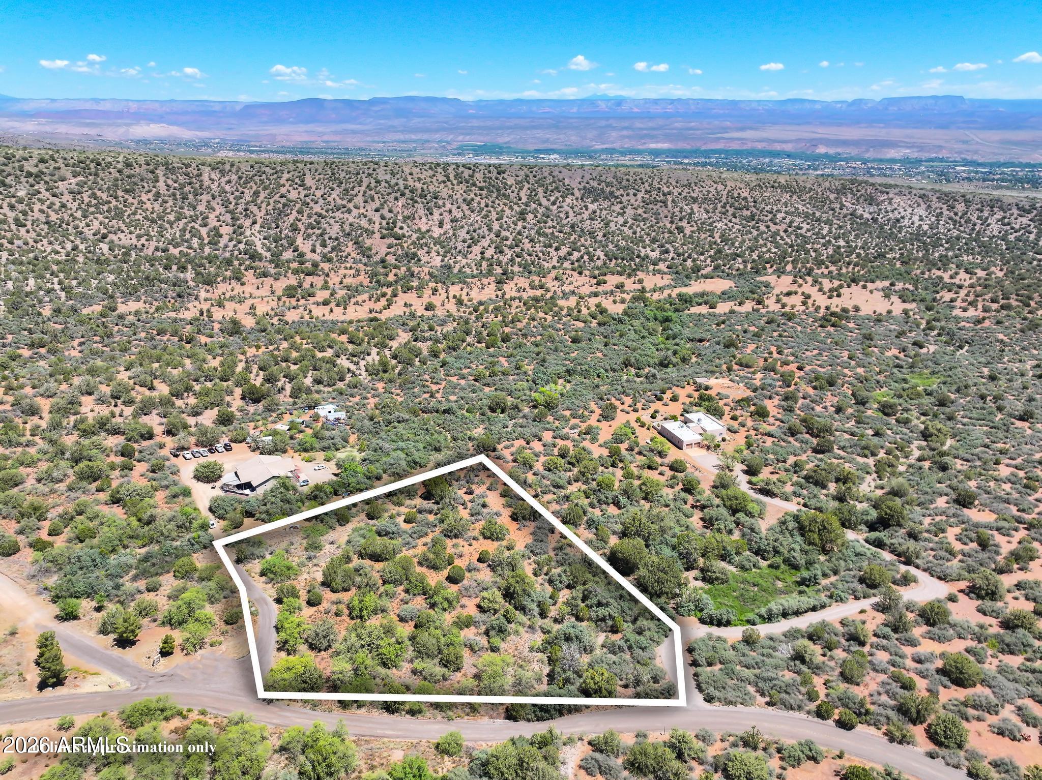 Nice flat lot with panoramic views with lots of mature vegetation for privacy. Perk test completed in 1998 for standard system. Beautiful neighborhood of custom homes waiting for your dream home!