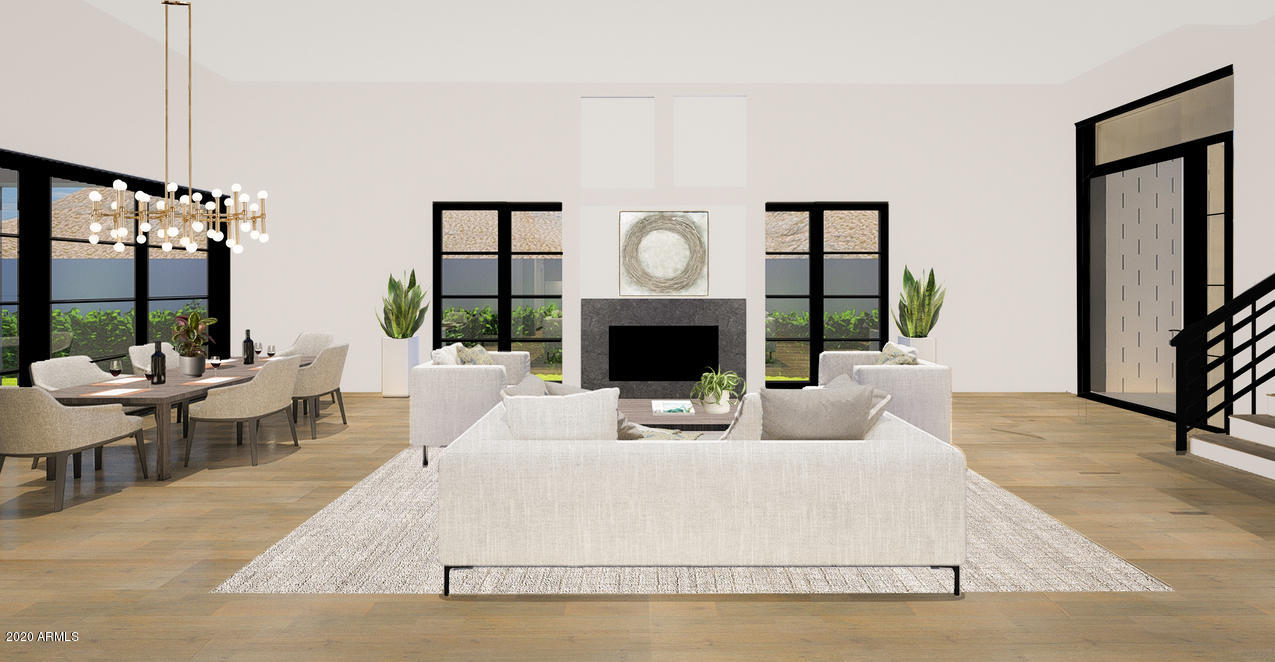 NESTLED AT THE BASE OF THE VALLEY'S MOST ICONIC LANDMARK, CAMELBACK MOUNTAIN, IS THE VILLAGE AT MOUNTAIN SHADOWS. THIS EXCLUSIVE, GUARD-GATED, RESORT-STYLE COMMUNITY IS COMPRISED OF 40 RESIDENCES, WITH JUST A HANDFUL OF LOTS LEFT. TO BUILT BY CULLUM HOMES IS THIS FLOOR PLAN FEATURING 3 BEDROOMS AND 3.5 BATHROOMS, HAS BEEN CAREFULLY CRAFTED TO SHOWCASE THE SURROUNDING MOUNTAINS.  GREAT ROOM WITH FIREPLACE. FORMAL DINING AREA WITH POCKET DOORS THAT OPEN ALL THE WAY UP TO THE PATIO AREA. SPACIOUS KITCHEN WITH ISLAND, EAT-AT BAR, WALK-IN PANTRY, SUBZERO SIDE-BY-SIDE FRIDGE/FREEZER, WOLF GAS 8-BURNER RANGE. OWNER'S SUITE WITH WALK-IN CLOSET, DOUBLE SINK VANITY, SEPARATE SHOWER AND TUB, PRIVATE TOILET ROOM, AND A SEPARATE EXIT OUT TO THE PATIO. AN ADDITIONAL BEDROOM ON THE MAIN LEVEL WITH EN-SUITE BATH AND WALK-IN CLOSET. LAUNDRY WITH EXTRA STORAGE AND ADDITIONAL POWDER ROOM. BUYERS CAN HAVE THE OPTION TO ADD AN ELEVATOR AT AN ADDITIONAL COST. UPSTAIRS HAS A SPACIOUS LOFT AREA FOR ENTERTAINING, AS WELL AS THE 3RD BEDROOM WITH LARGE WALK-IN CLOSET AND EN-SUITE BATH. A FRONT DECK AREA TO TAKE ADVANTAGE OF THE SURROUNDING MOUNTAIN VIEWS. 3-CAR GARAGE INCLUDED. COMMUNITY POOL AND SPA AND LARGE COMMUNITY PARK. ALL RESIDENTS IN THE VILLAGE RECEIVE ACCESS TO THE PLETHORA OF AMENITIES AVAILABLE AT THE MOUNTAIN SHADOWS RESORT. GUARD GATED 24/7 FOR PRIVACY AND SECURITY SO YOU CAN ENJOY THAT "LOCK-N-GO" LIFESTYLE!