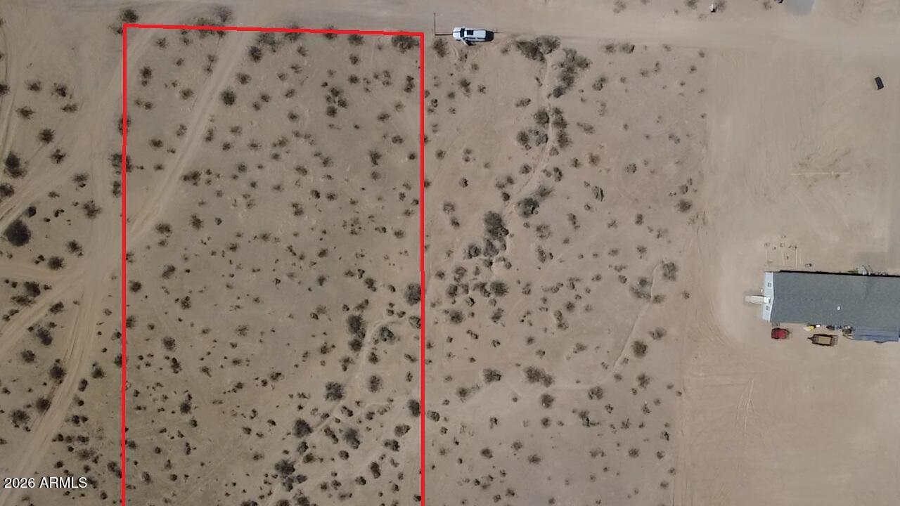 Your opportunity to build from the ground up starts here. This 1.25-acre lot in Tonopah sits flat and ready, with power already running to the street -- no surprise costs before you even break ground. A shallow water table keeps well installation simple and budget-friendly, and the level terrain means little to no site prep standing between you and construction. Plenty of space, room to spread out, and the groundwork already done -- bring your blueprints and get started.
Want even more elbow room? The lot next door -- another 1.25 acres -- is also on the market, so you could combine the two and build on a full 2.5 acres of open land.